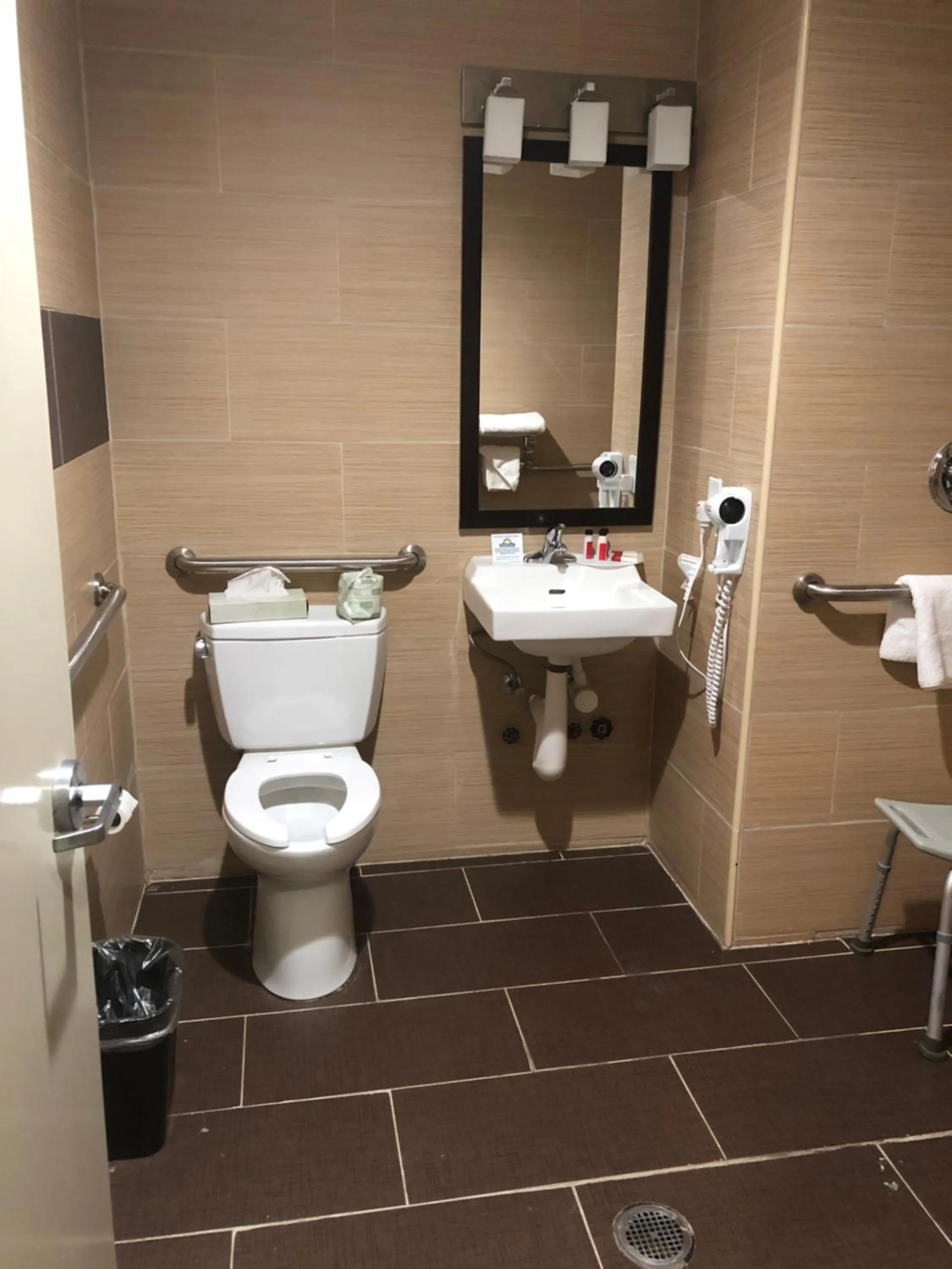 Toilet in Days Inn by Wyndham Brooklyn Borough Park