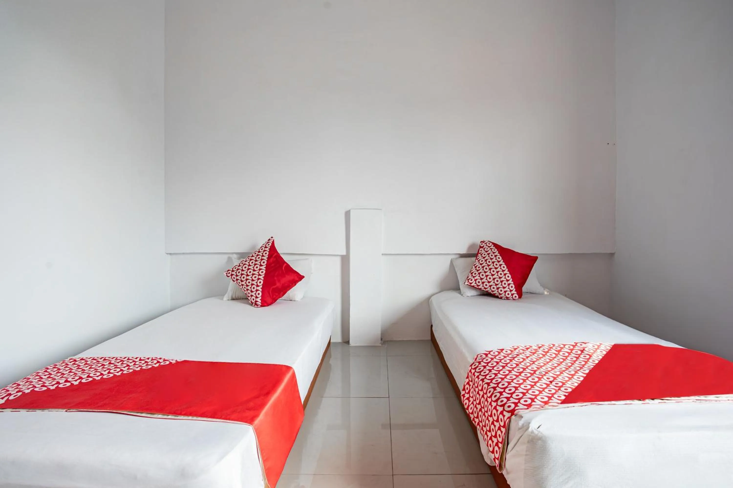 Bedroom in Hotel O Owo Guest House Syariah