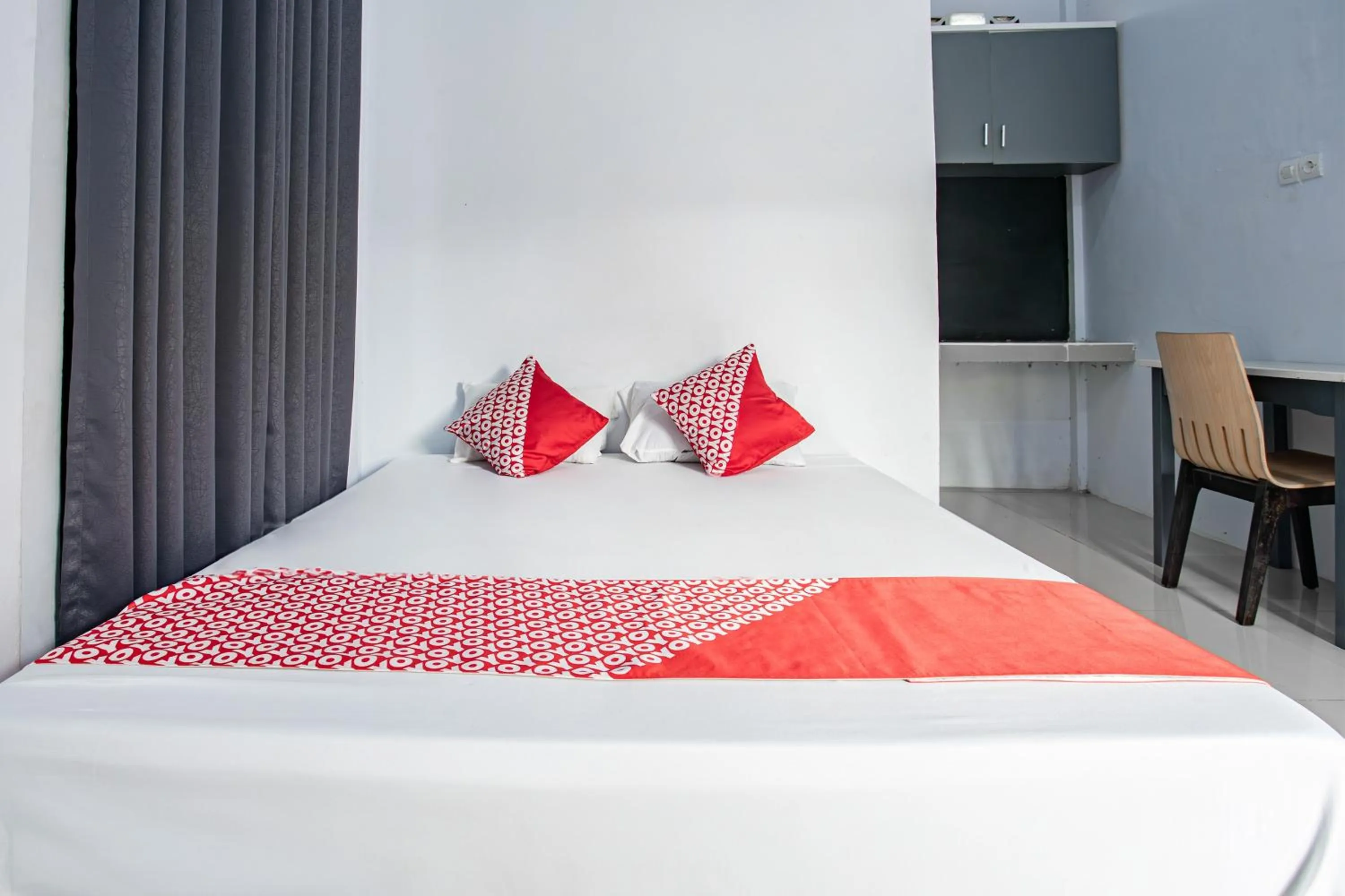 Bedroom in Hotel O Owo Guest House Syariah