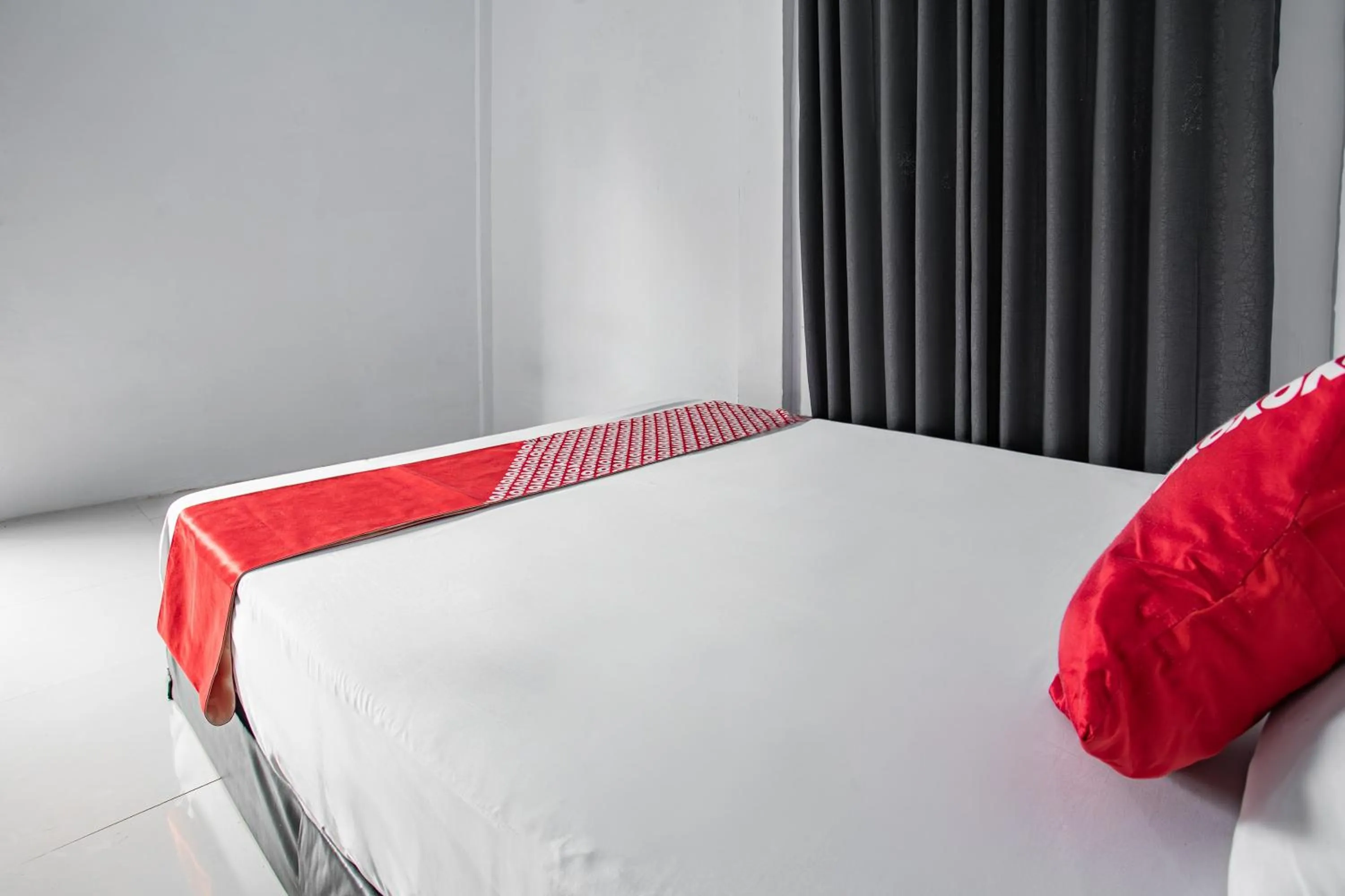 Bedroom in Hotel O Owo Guest House Syariah