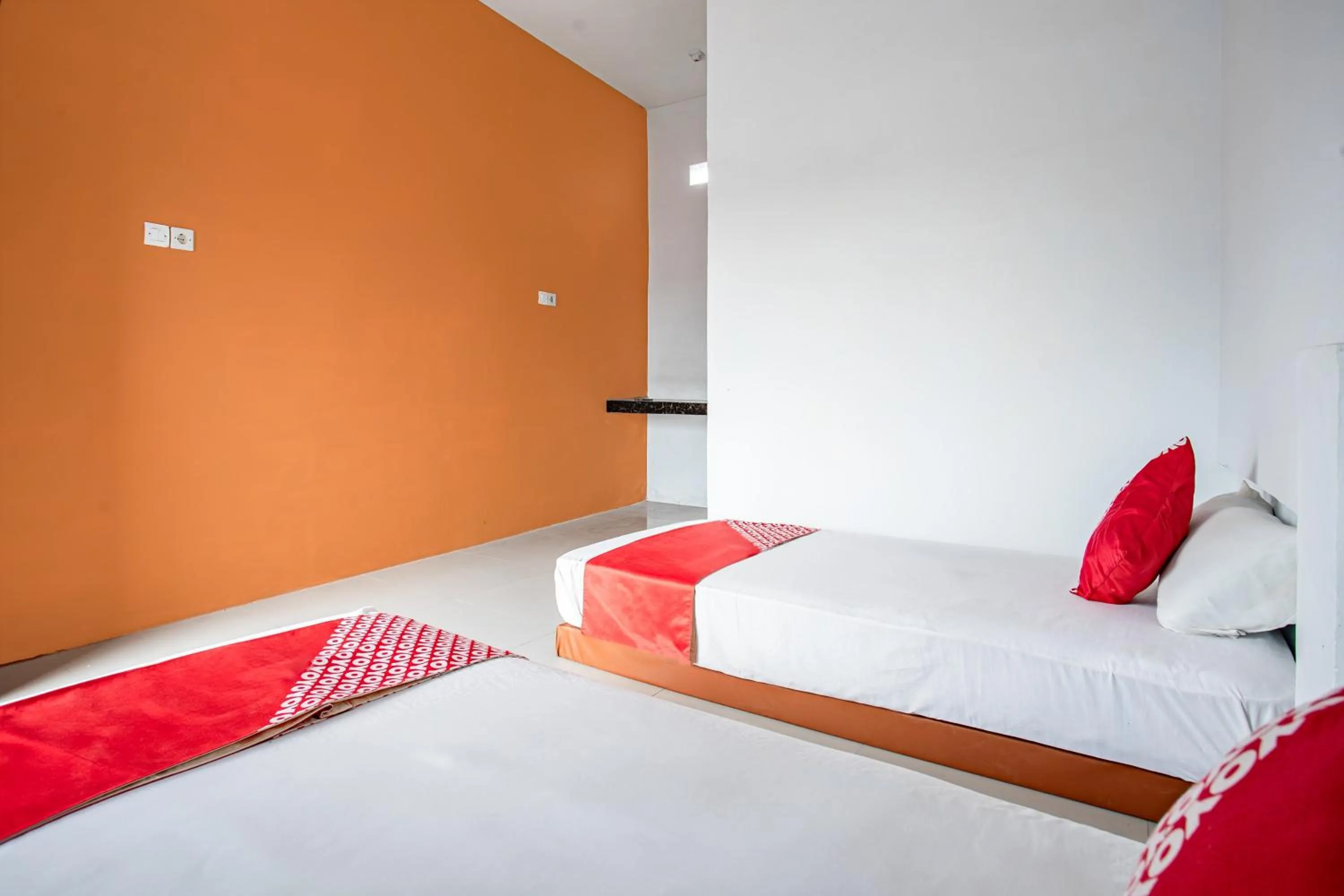 Bedroom in Hotel O Owo Guest House Syariah