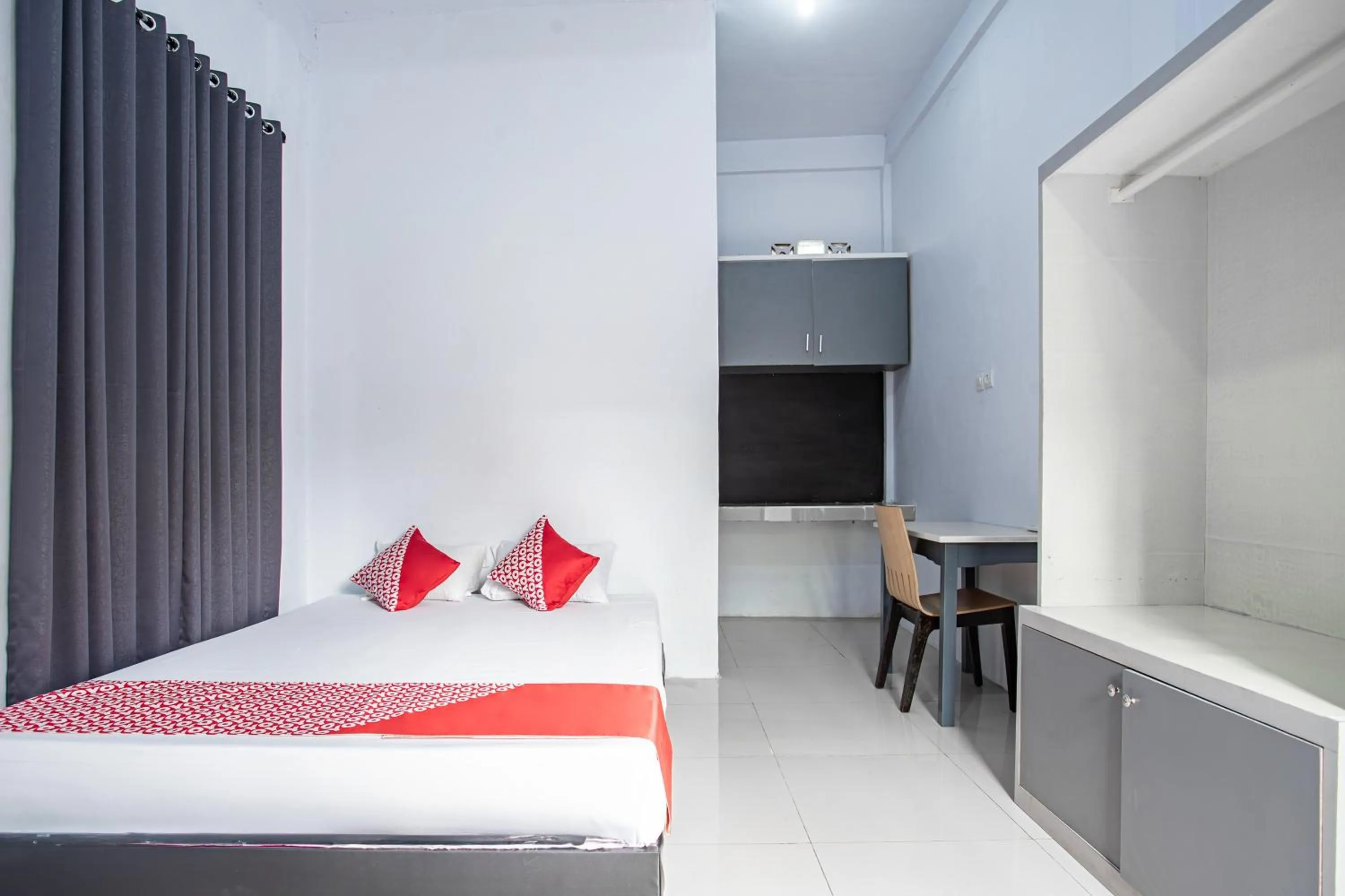 Bedroom in Hotel O Owo Guest House Syariah