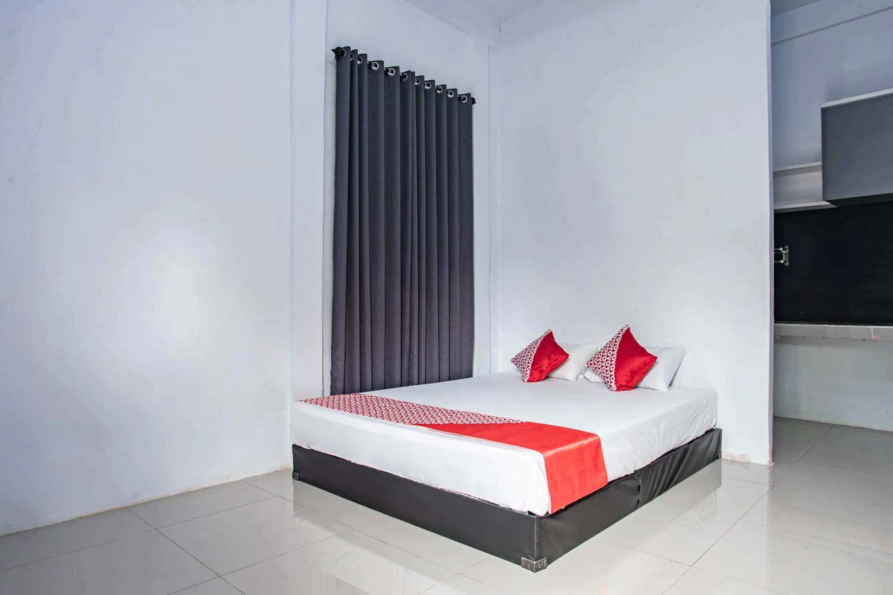 Bedroom in Hotel O Owo Guest House Syariah