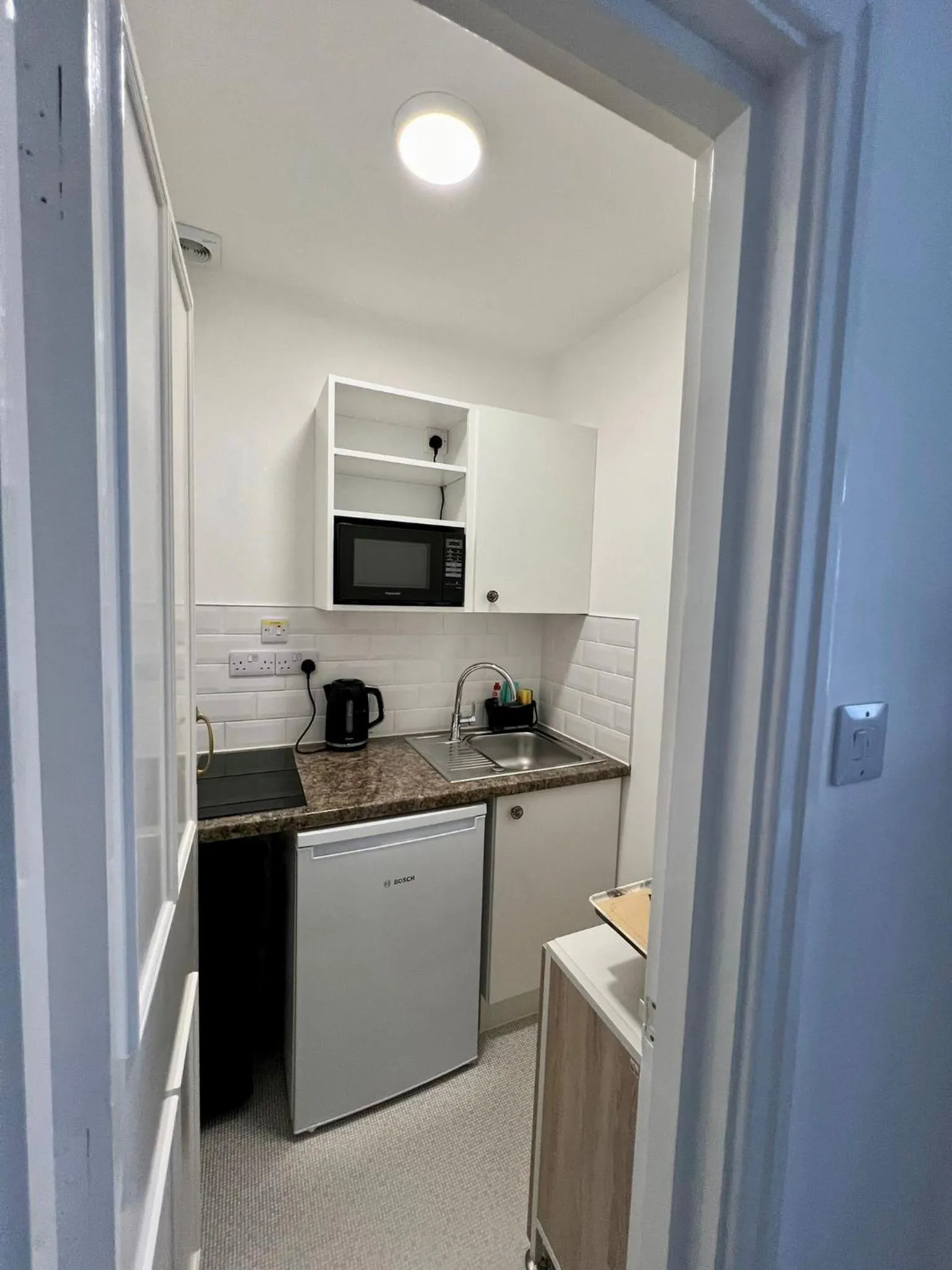 Kitchen or kitchenette in Sarum Apart-Hotel