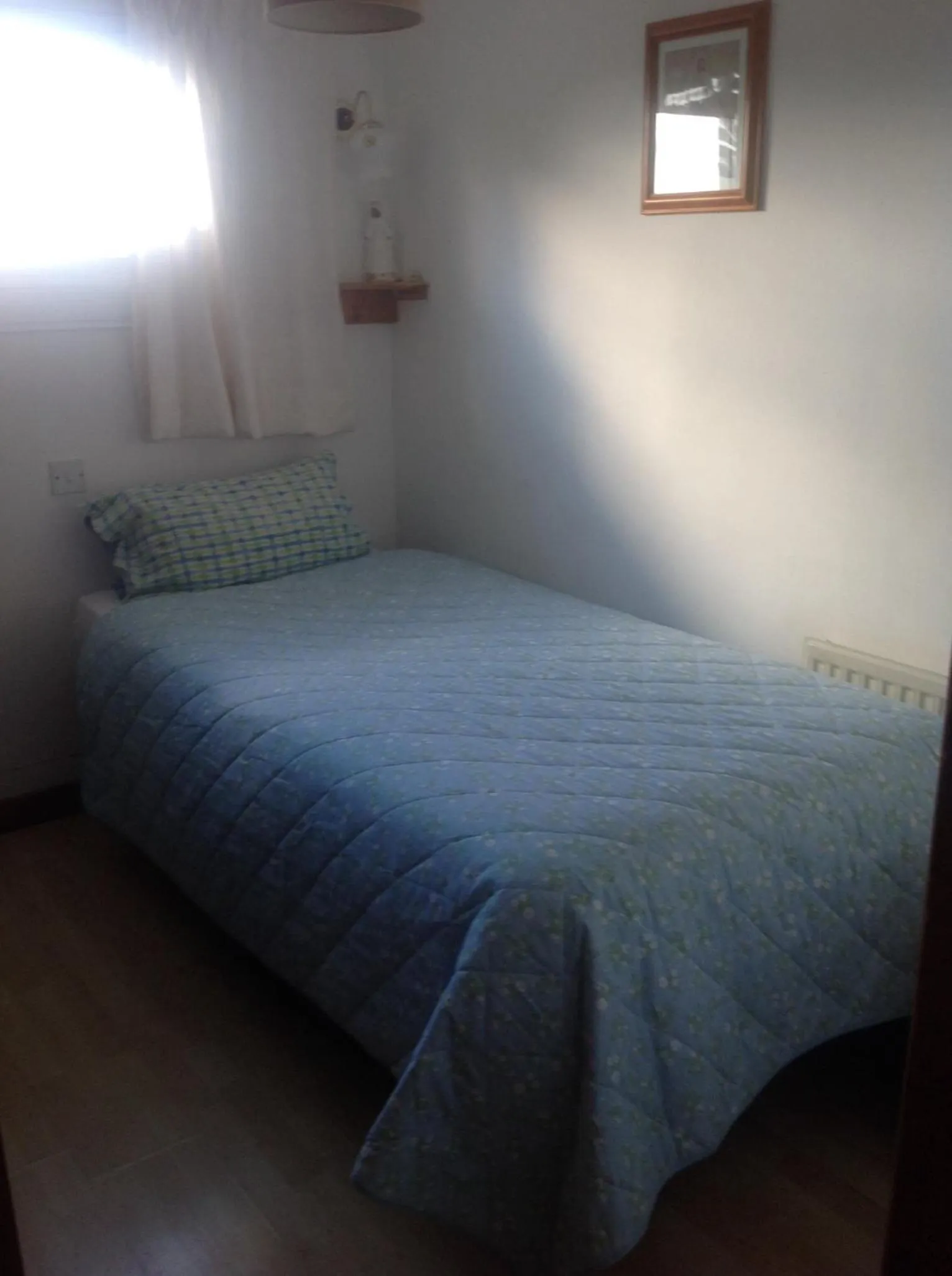 Bed in Divine Mercy B&B