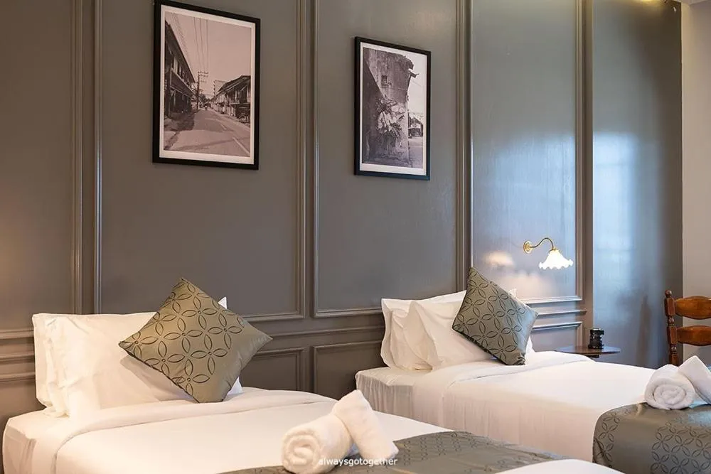 Bed in Pattanipirom Boutique Hotel