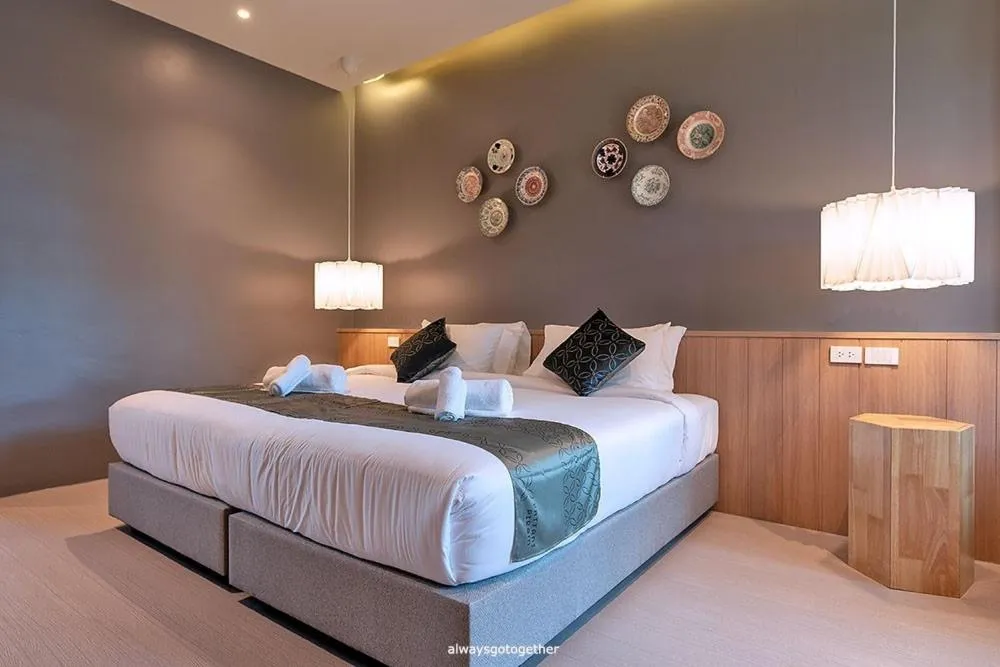 Bed in Pattanipirom Boutique Hotel