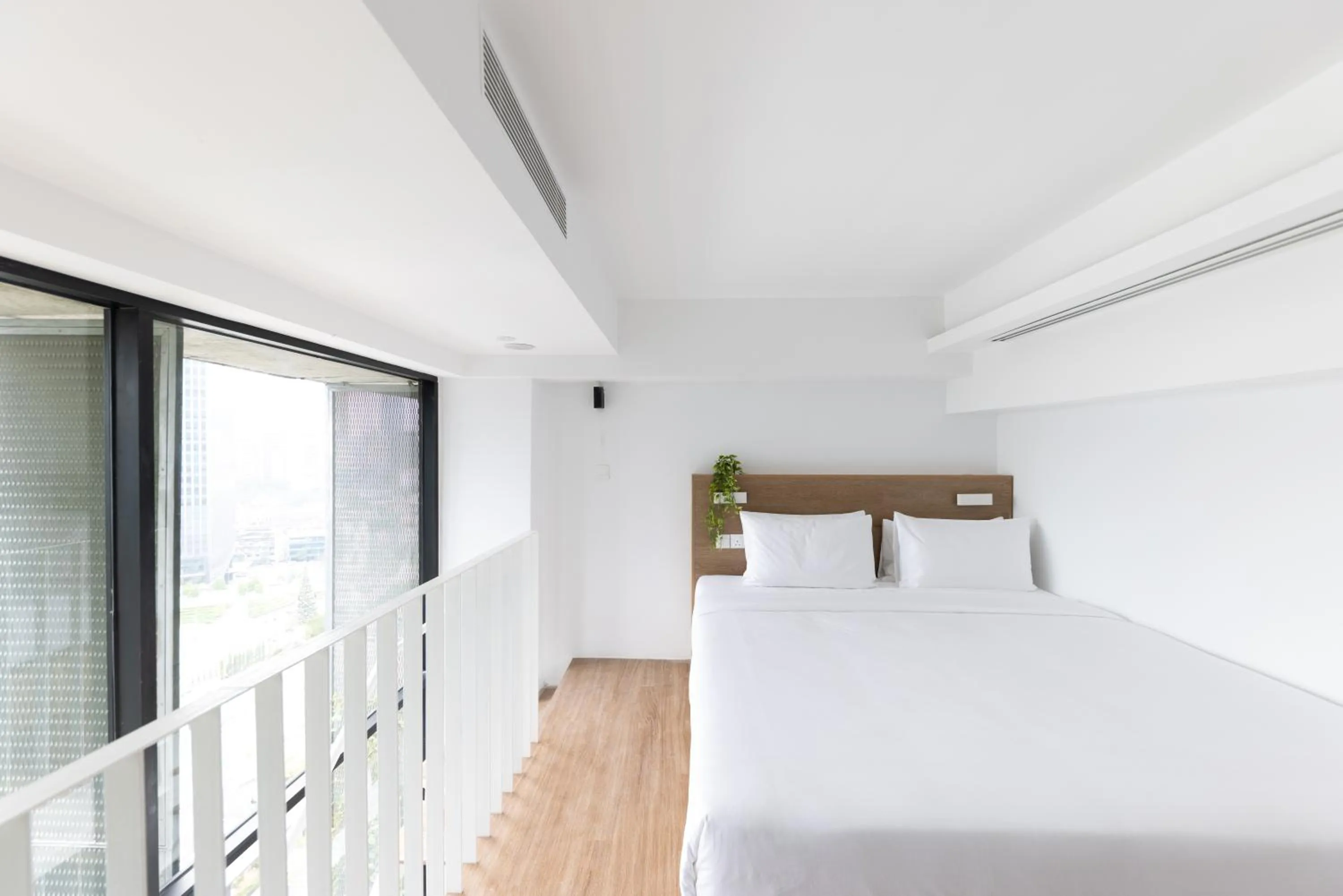 Bed in Lloyd's Inn Kuala Lumpur