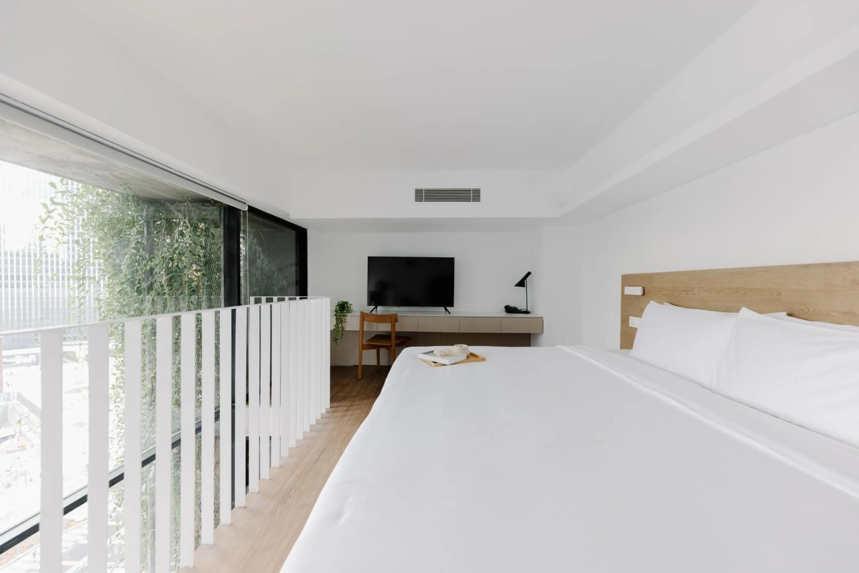 Bed in Lloyd's Inn Kuala Lumpur