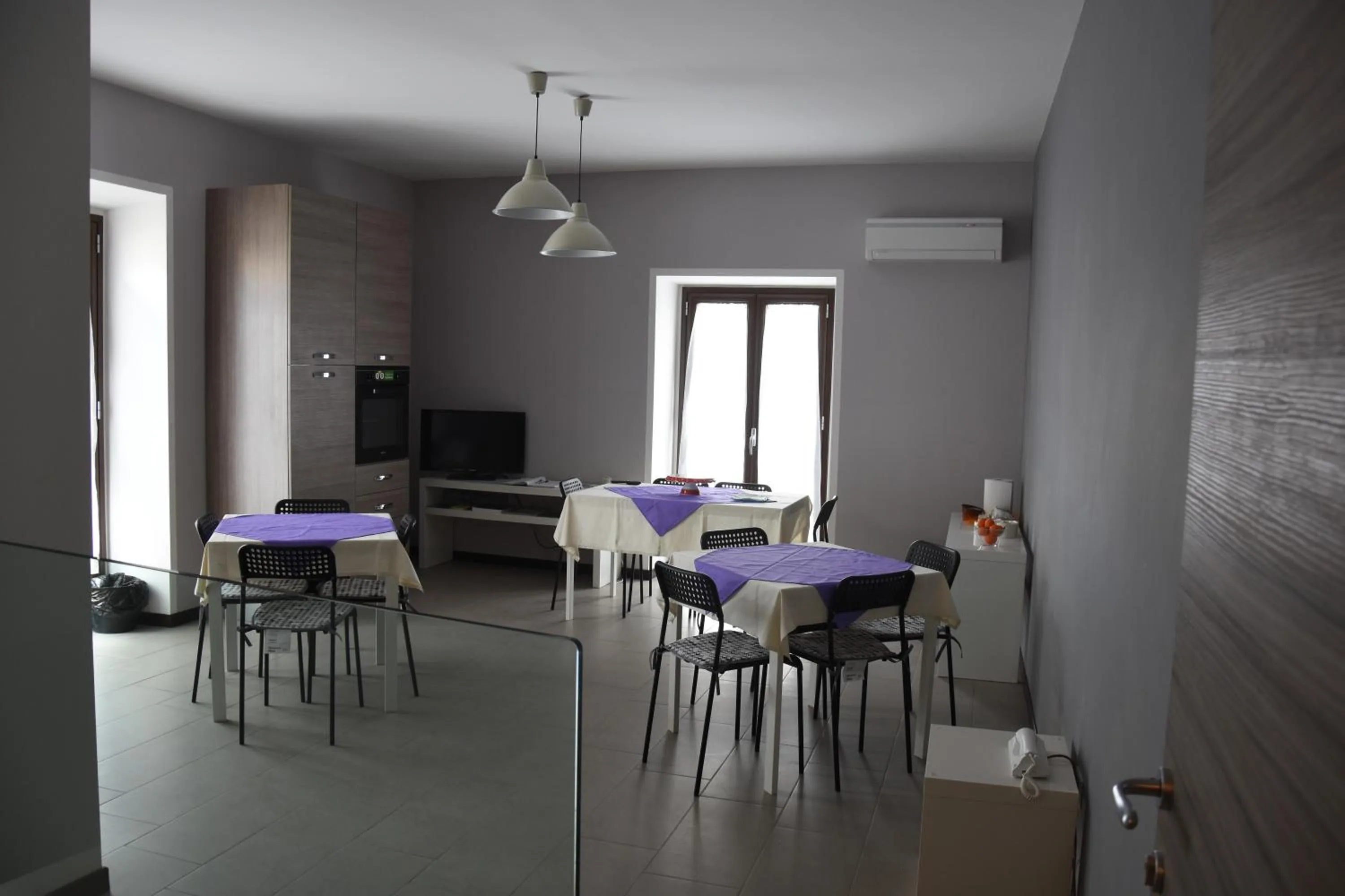 Communal lounge/ TV room in Casa Natia