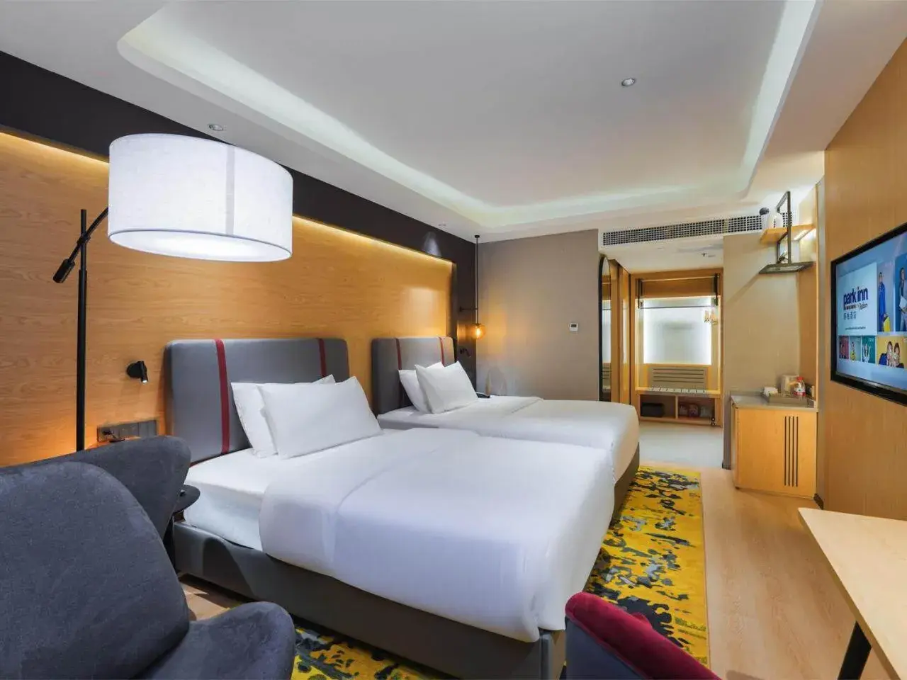 Bed in Park Inn by Radisson Chongqing Yuelai International Expo Center Bed in Park Inn by Radisson Chongqing Yuelai International Expo Center