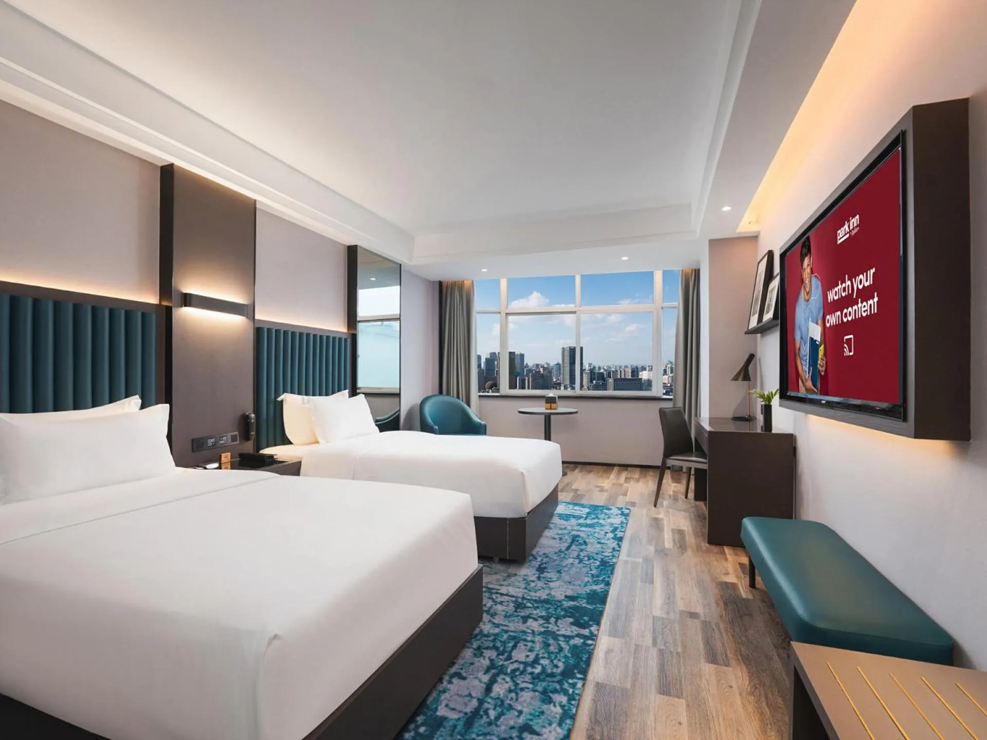 Bed in Park Inn by Radisson Hanzhong Central Square & High speed rail station