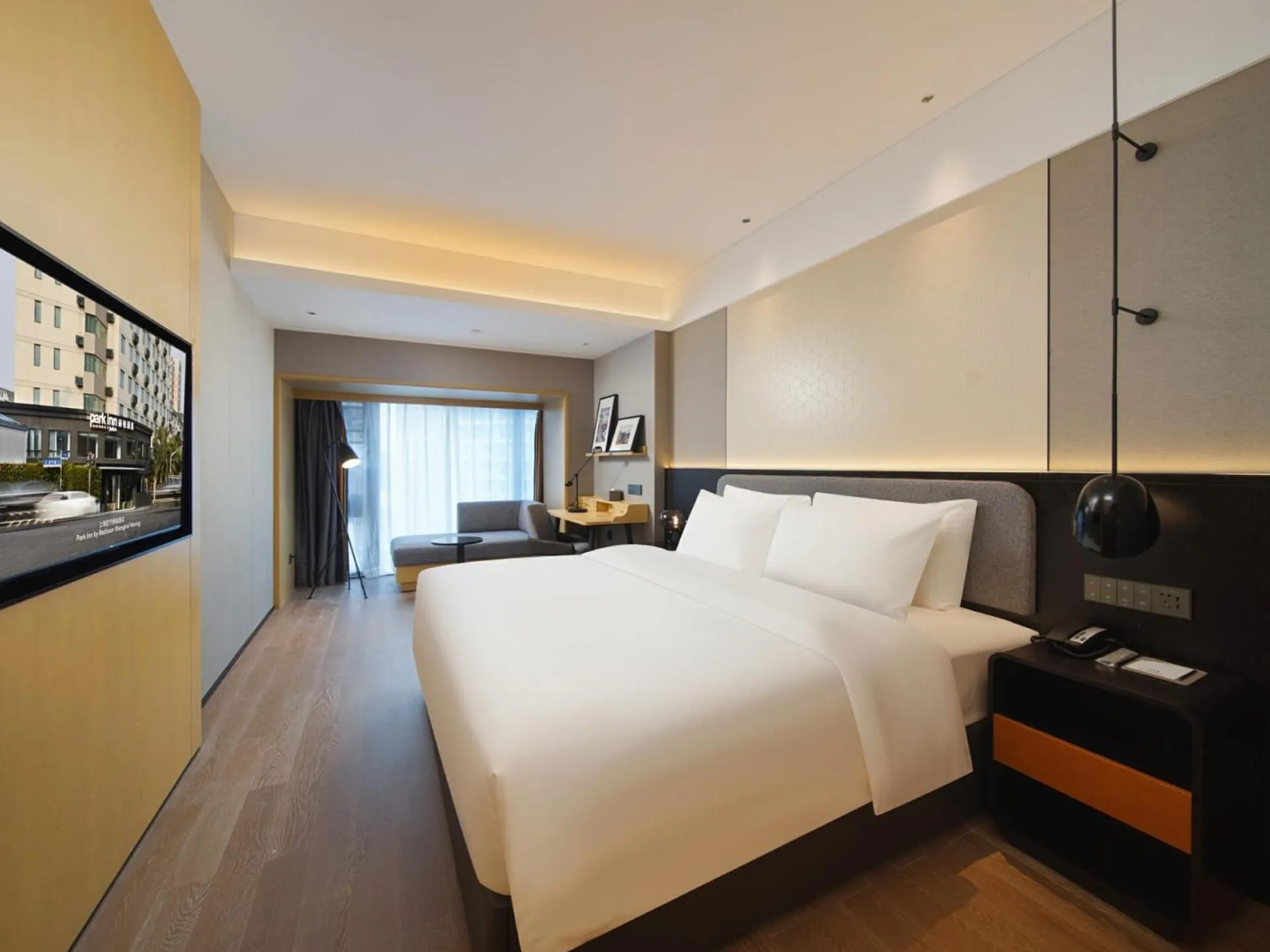 Bed in Park Inn by Radisson Chengdu FengHuang Mountain Sports Park