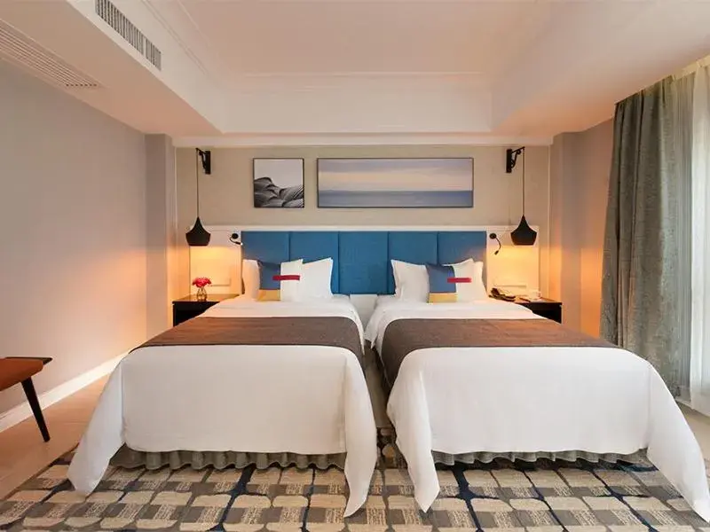 Bed in Park Inn by Radisson Beihai Silver Beach Wanda Plaza Bed in Park Inn by Radisson Beihai Silver Beach Wanda Plaza