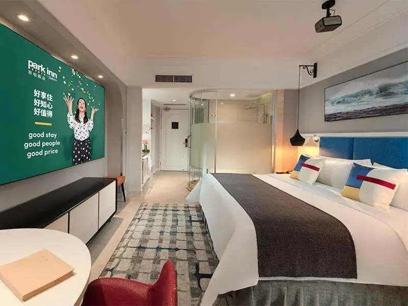 Bed in Park Inn by Radisson Beihai Silver Beach Wanda Plaza Bed in Park Inn by Radisson Beihai Silver Beach Wanda Plaza