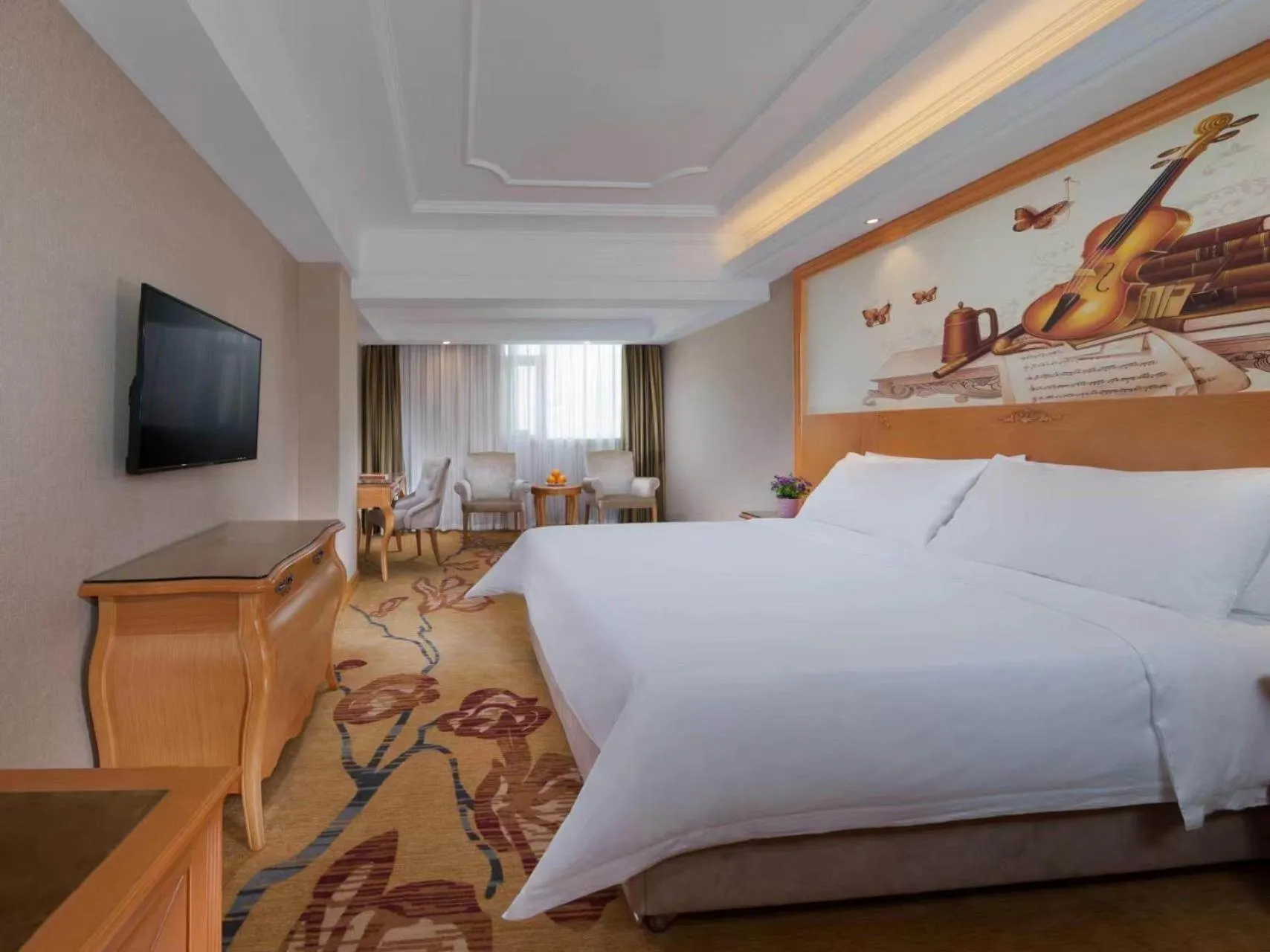 Bed in Vienna International Hotel Shenzhen Longhua Xiken