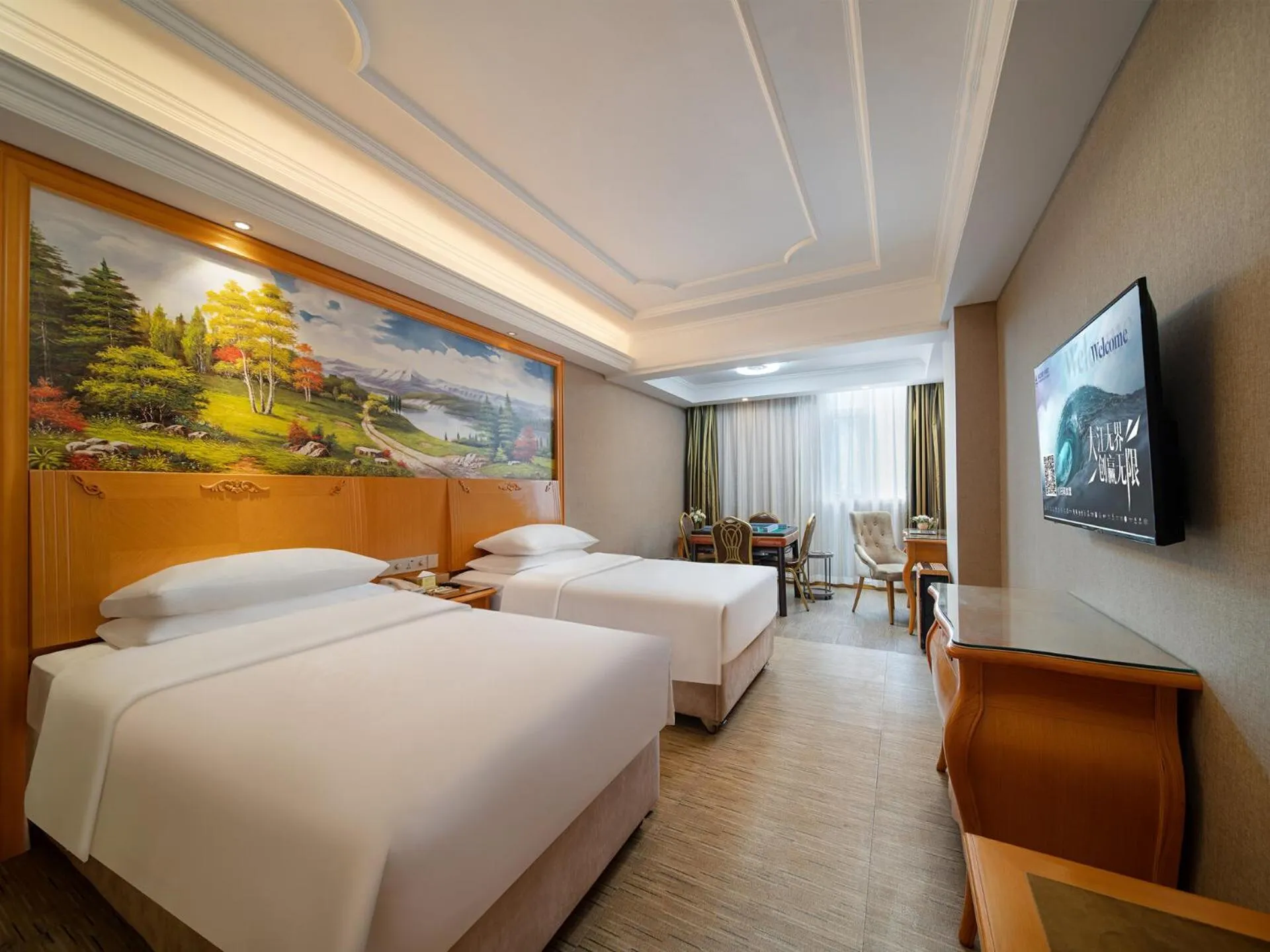 Bed in Vienna International Hotel Shenzhen Longhua Xiken