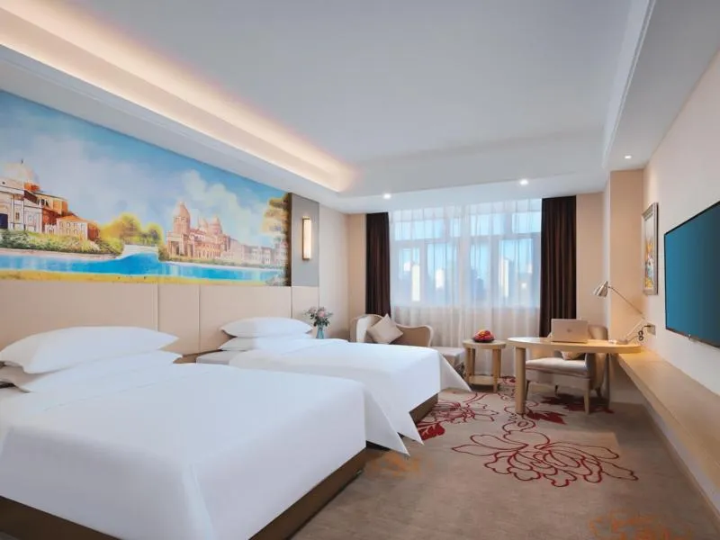Bed in Vienna International Hotel FuJian PuTian Pearl