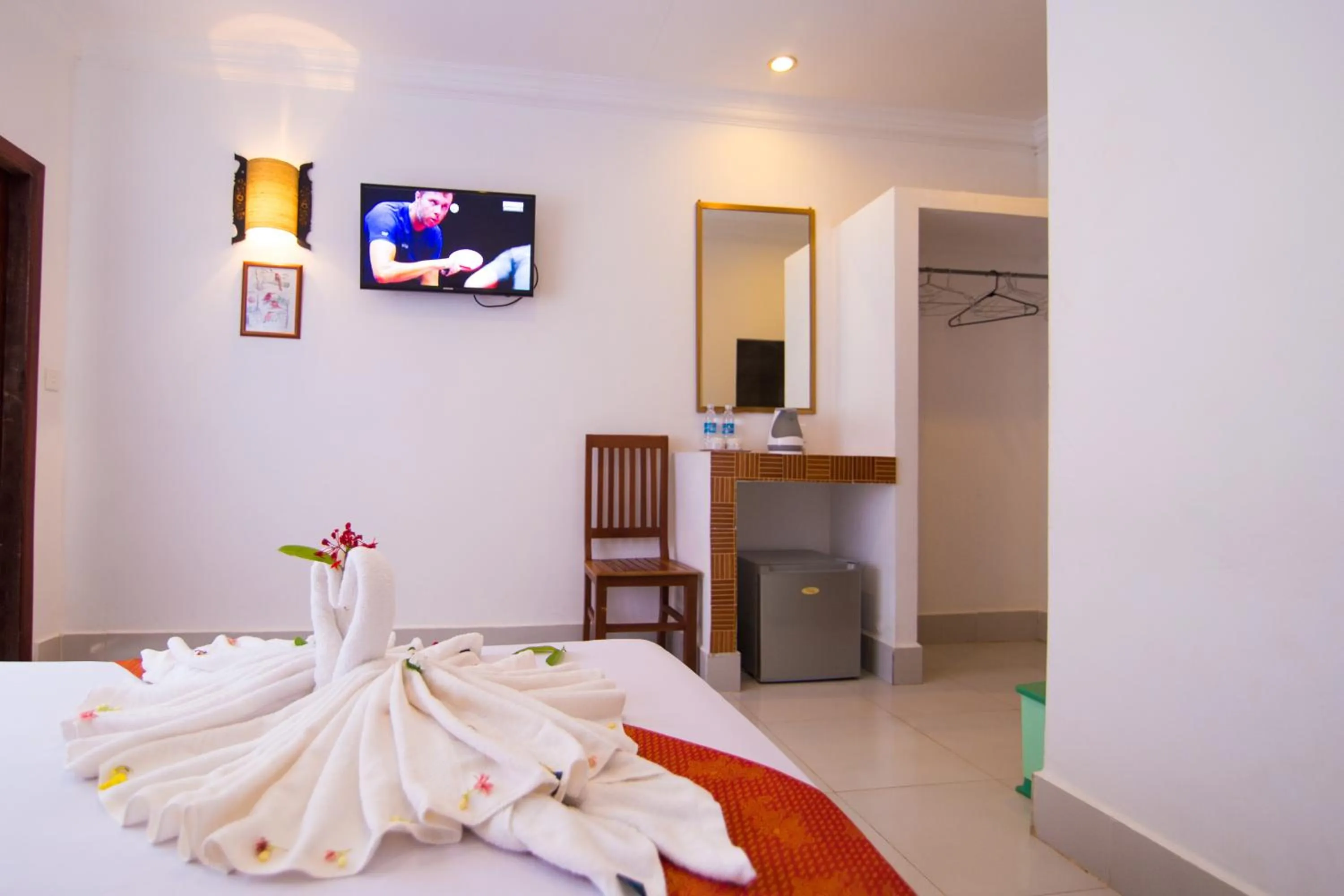 Photo of the whole room, Bed in Blossoming Romduol Boutique