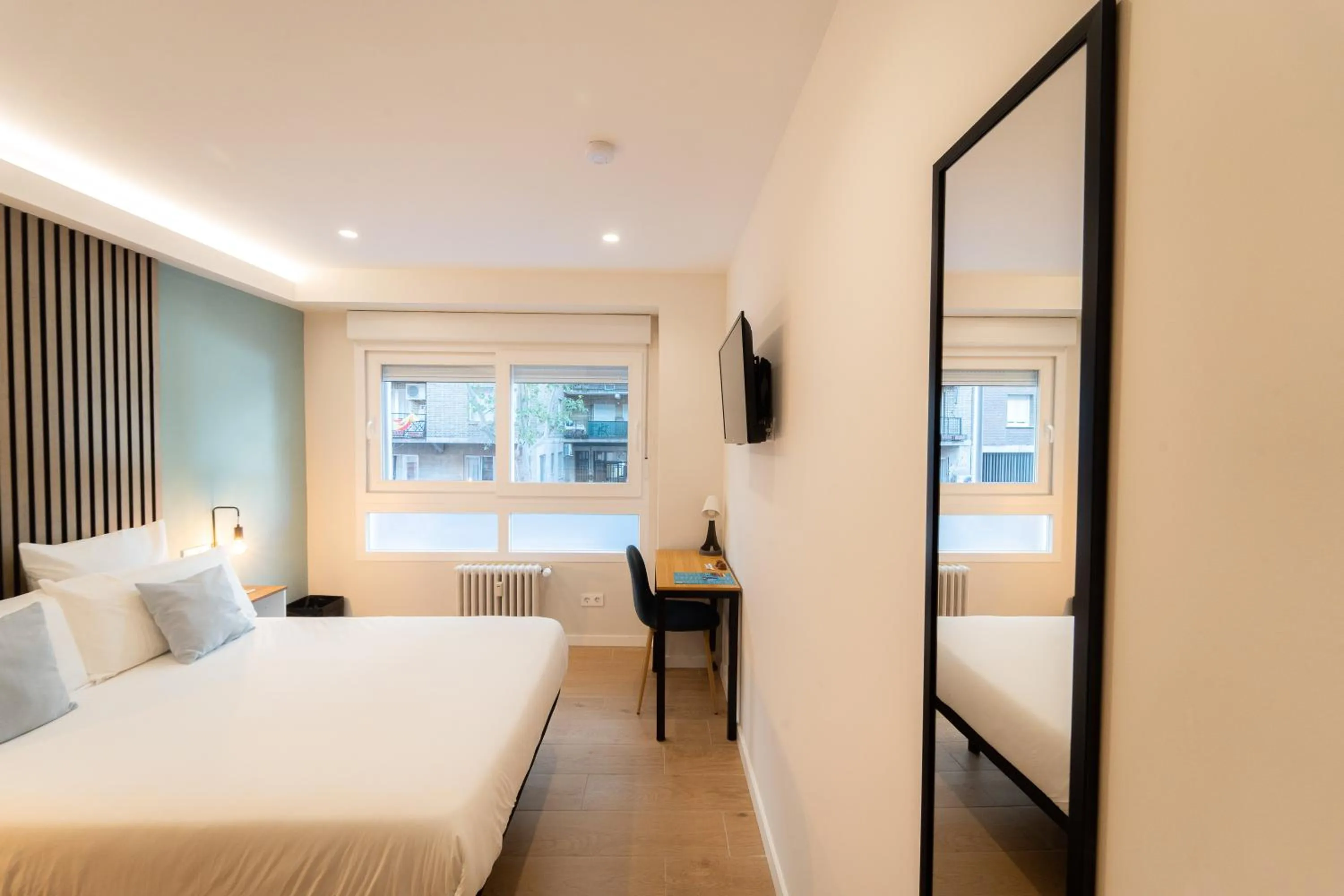 Bed in I'M Room Suites Nuevos Ministerios - Bernabeu 'Digital Access'