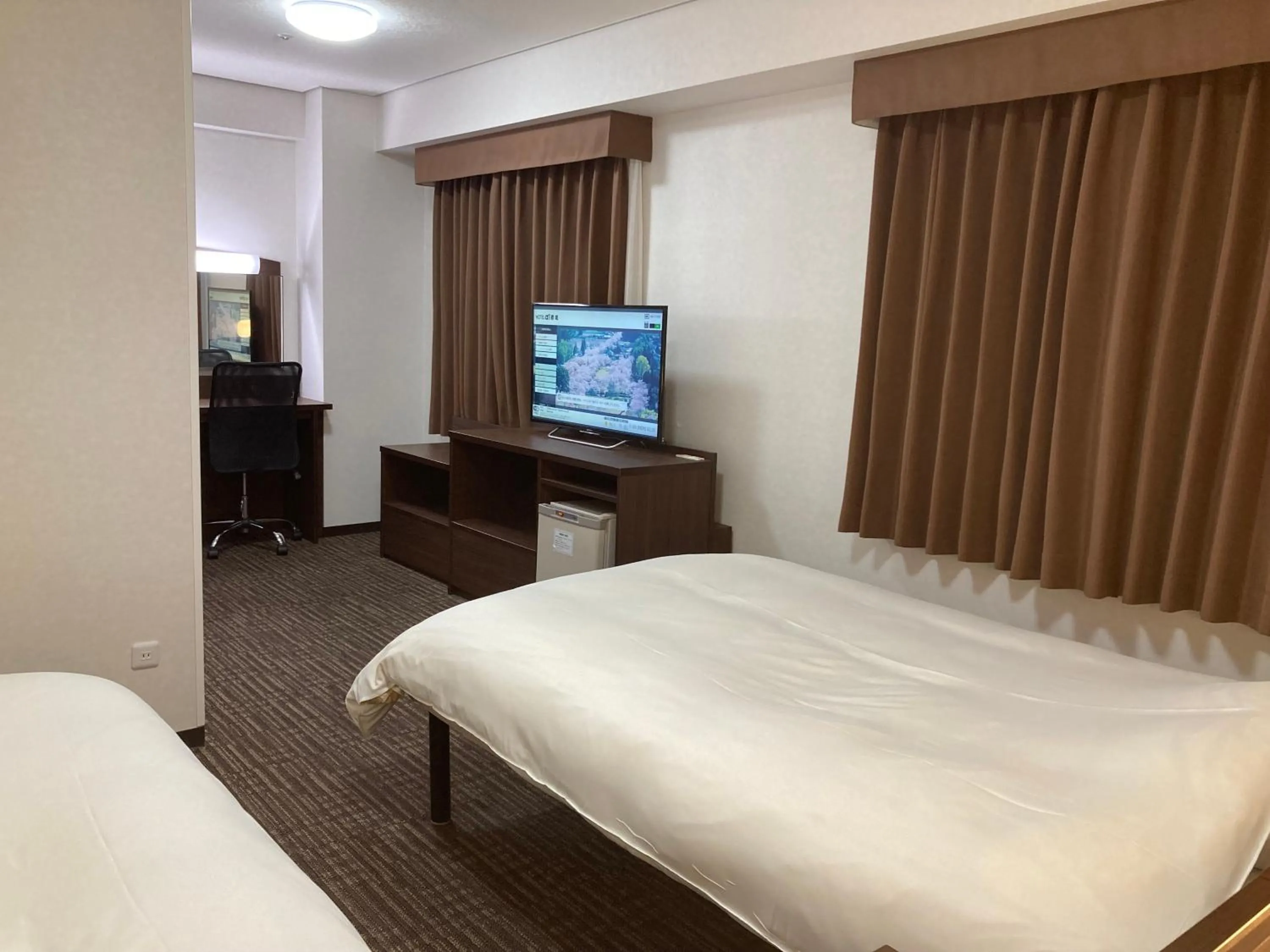 Bed in Hotel Alpha-One Miyakonojo