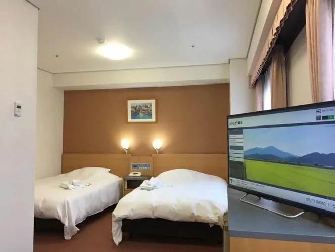 Photo of the whole room, Bed in Hotel Alpha-One Sakata