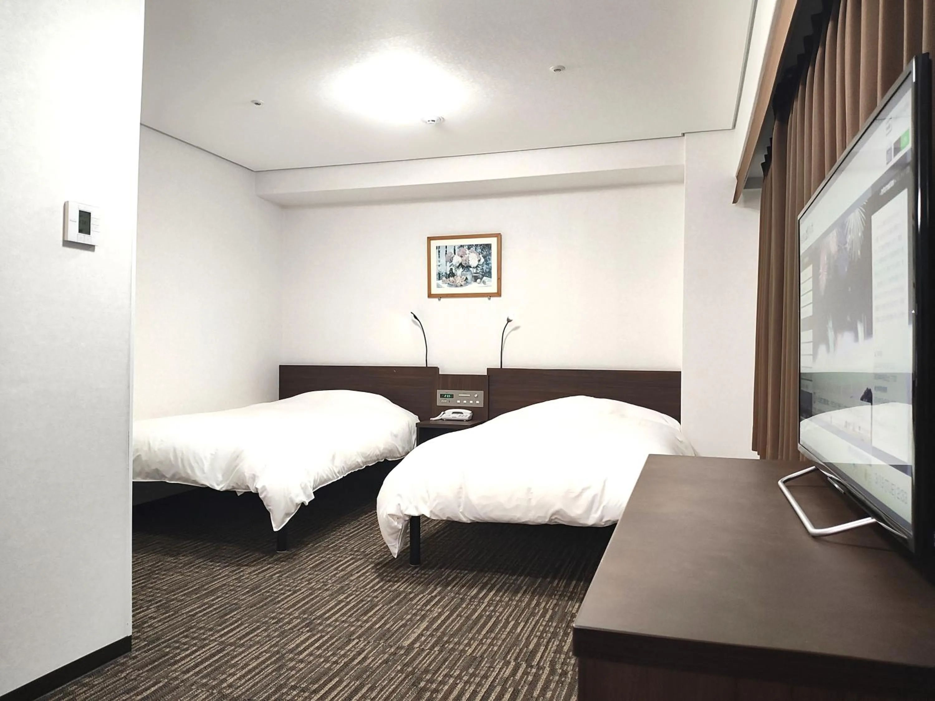 Bed in Hotel Alpha-One Yatsushiro