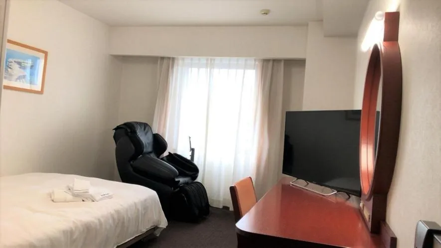 Bed in Kanazawa City Hotel