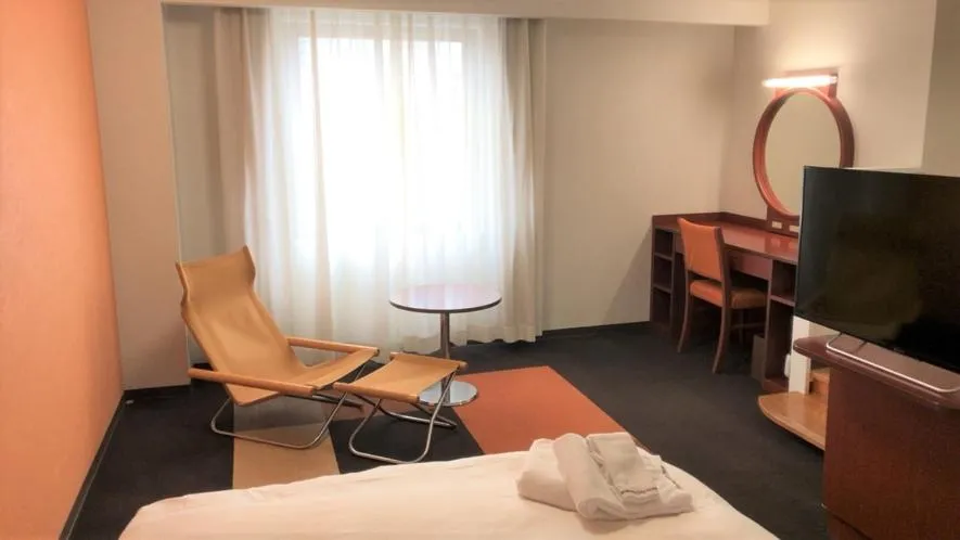 Bed in Kanazawa City Hotel