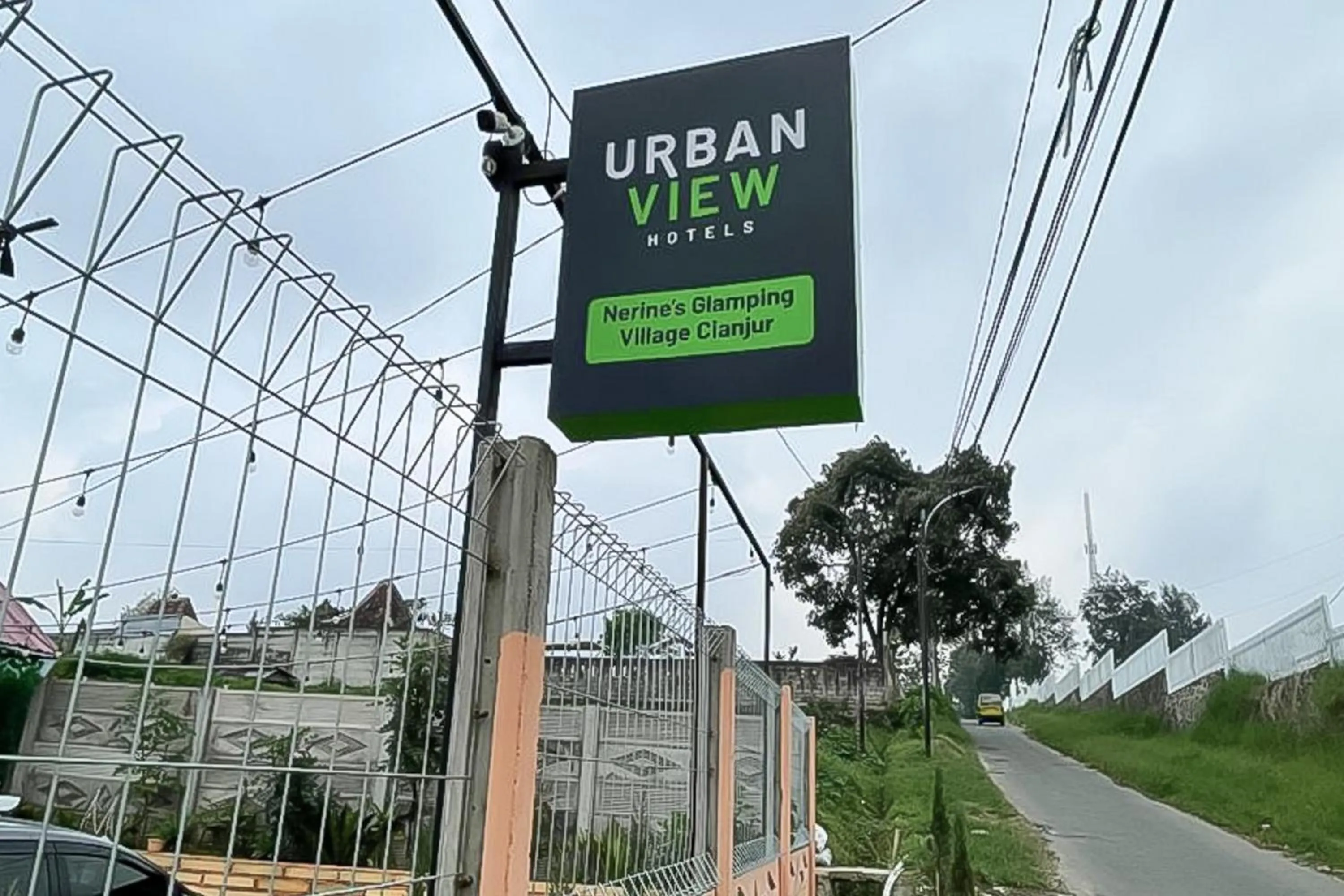 Property logo or sign in Urbanview Hotel Nerine's Glamping Village Cipanas by RedDoorz