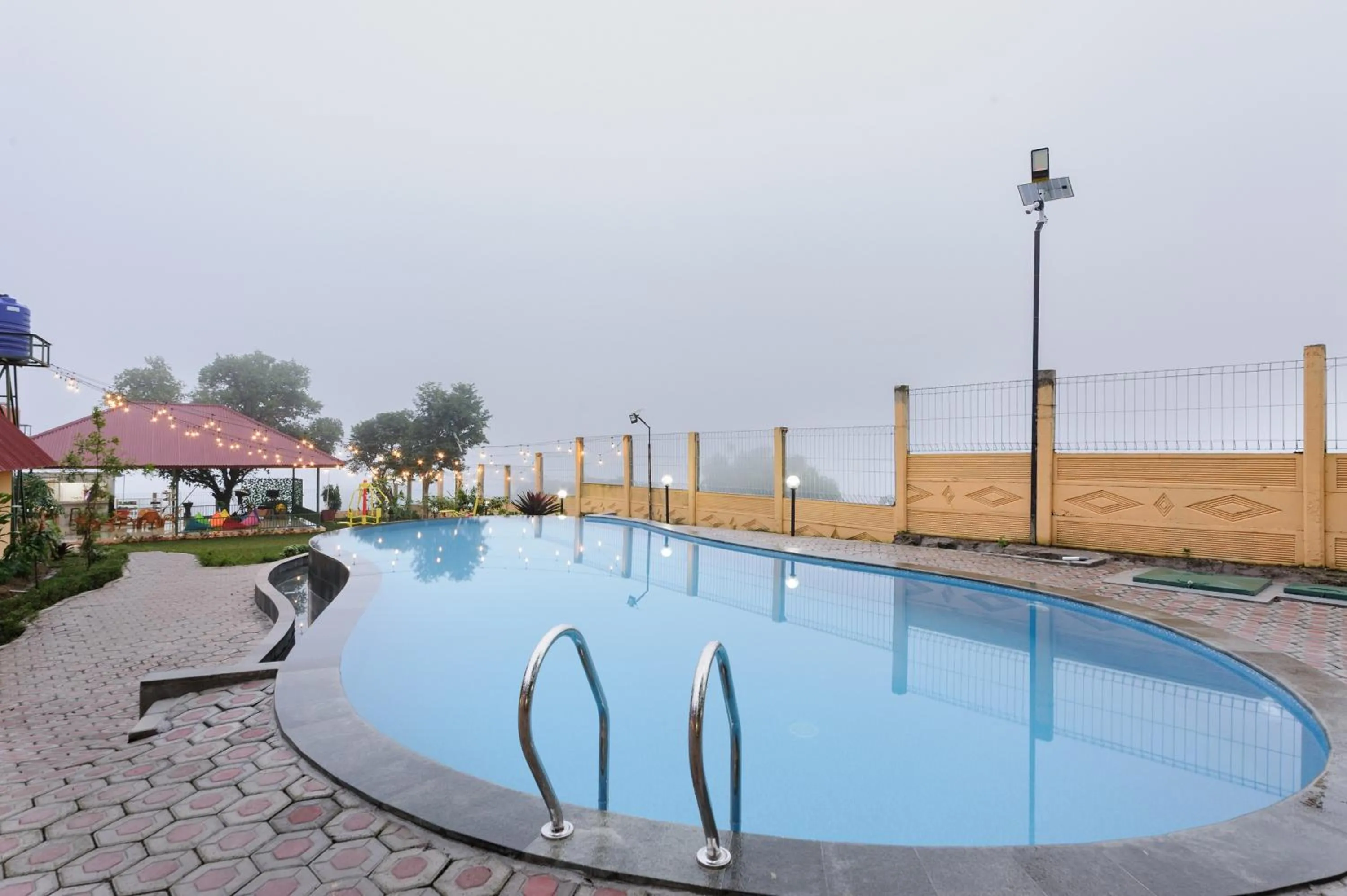 Swimming pool in Urbanview Hotel Nerine's Glamping Village Cipanas by RedDoorz