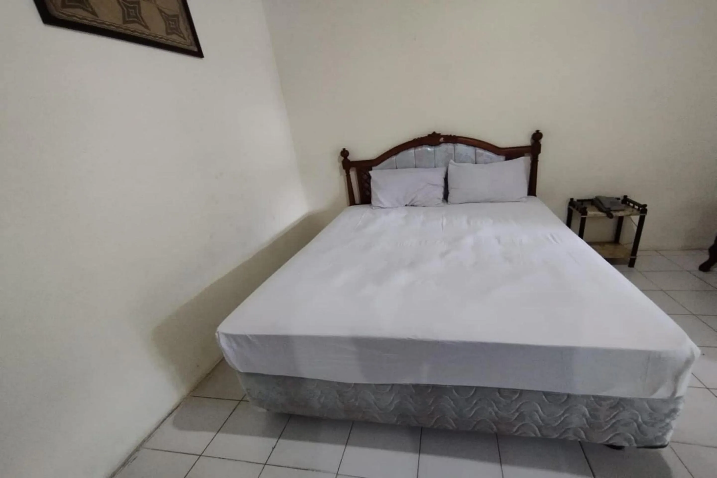 Bedroom, Bed in OYO 93485 Hotel Kenzie Sentani