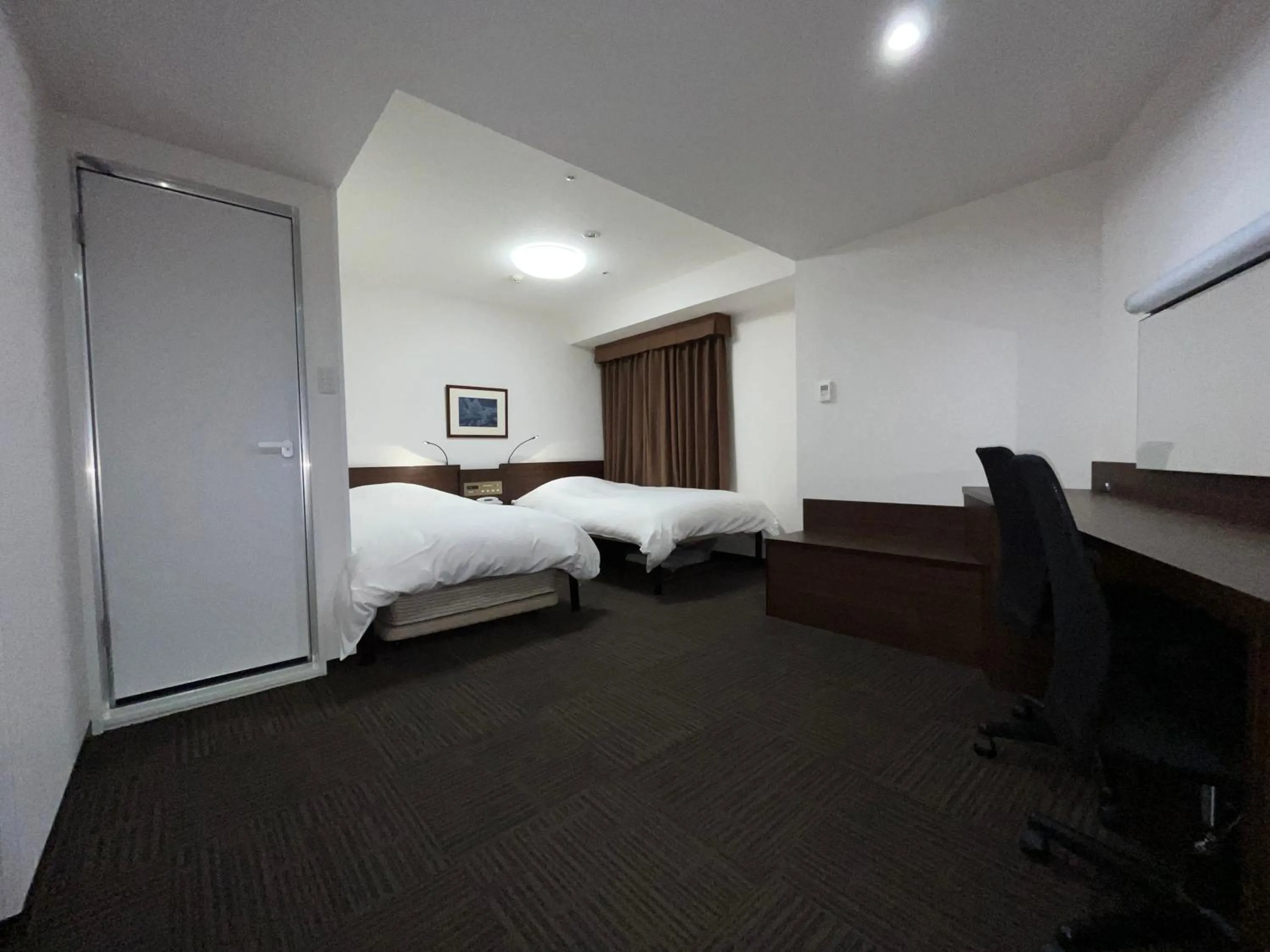 Bed in Hotel Alpha-One Kurashiki