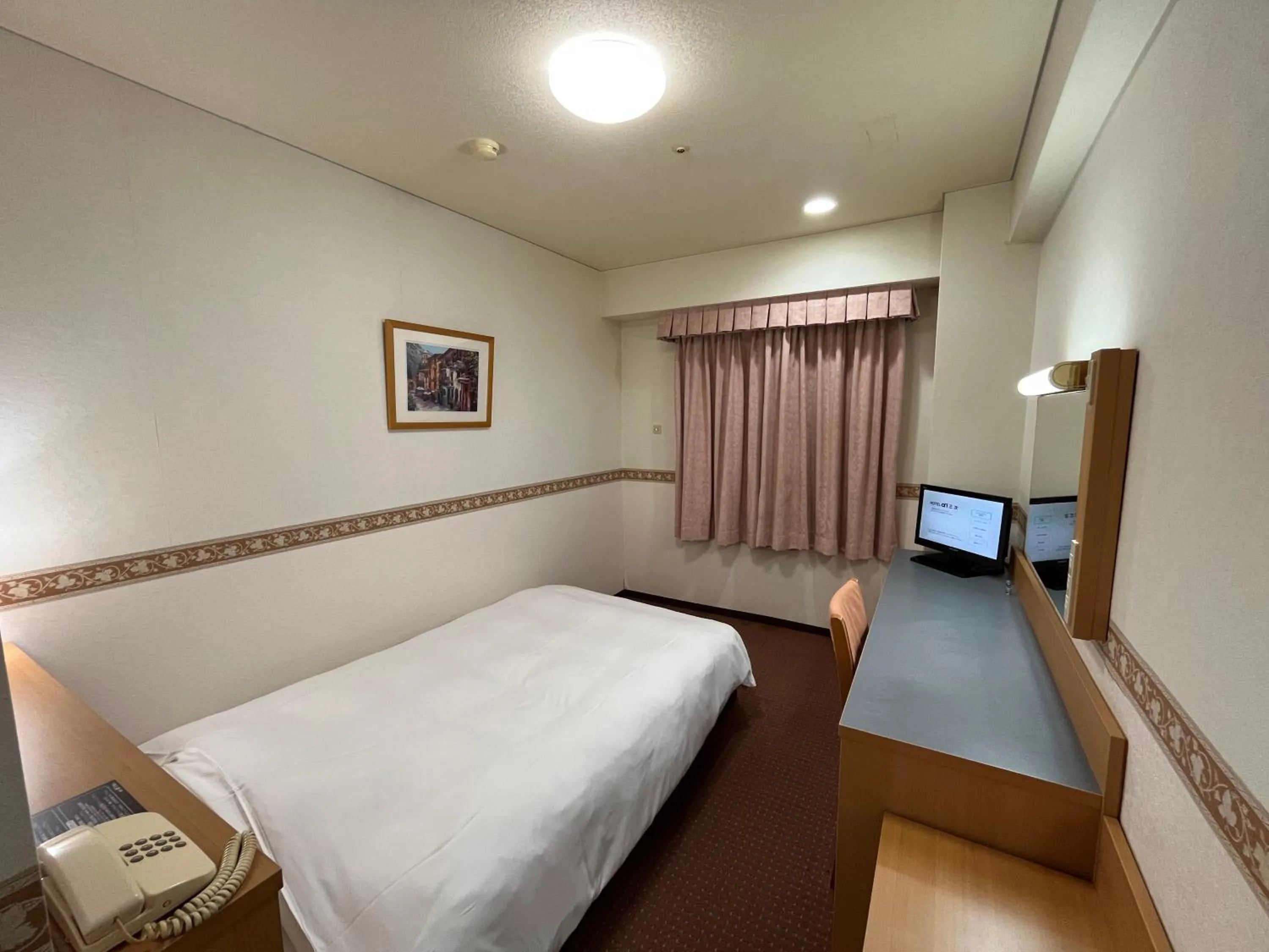 Bed in Hotel Alpha-One Miyoshi