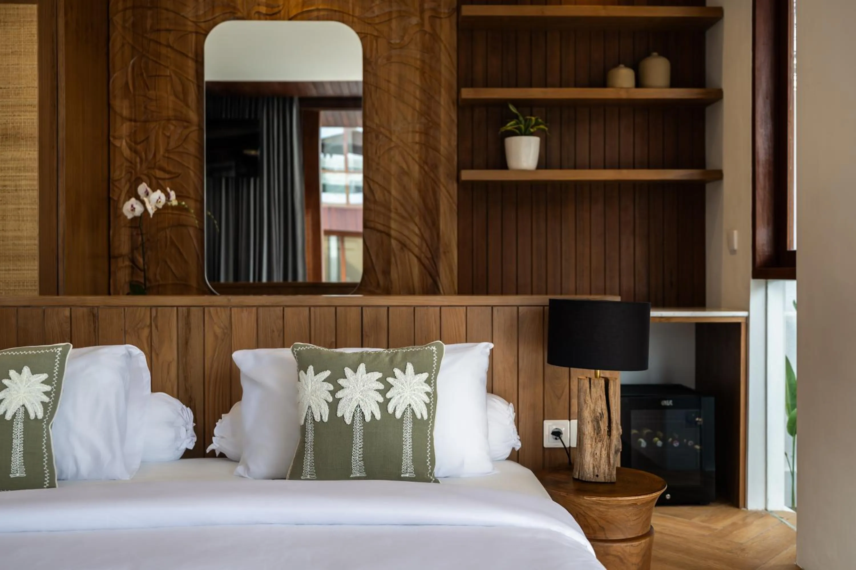 Bed in AMR Echo Beach Villa's Canggu