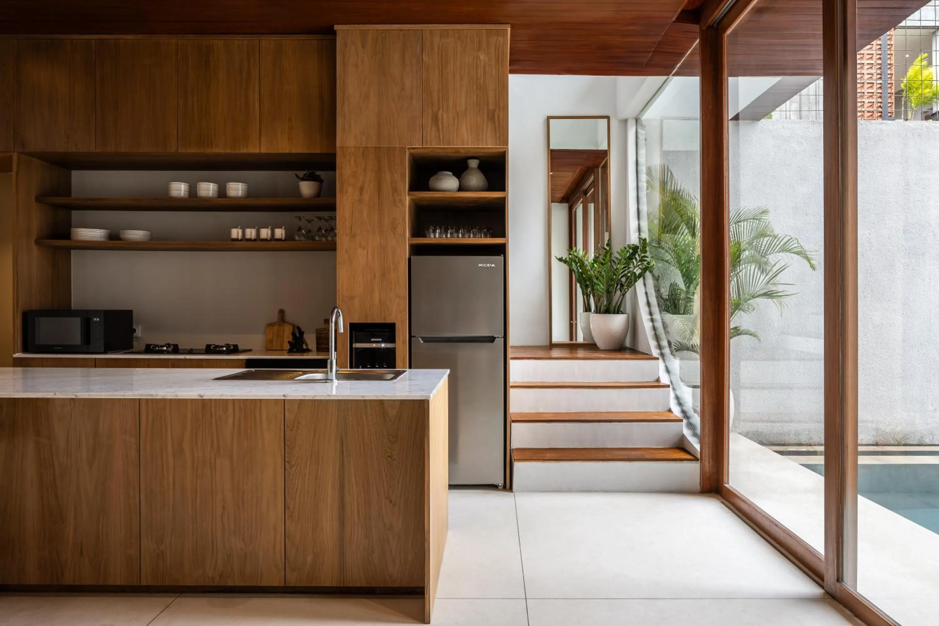 Kitchen or kitchenette in AMR Echo Beach Villa's Canggu