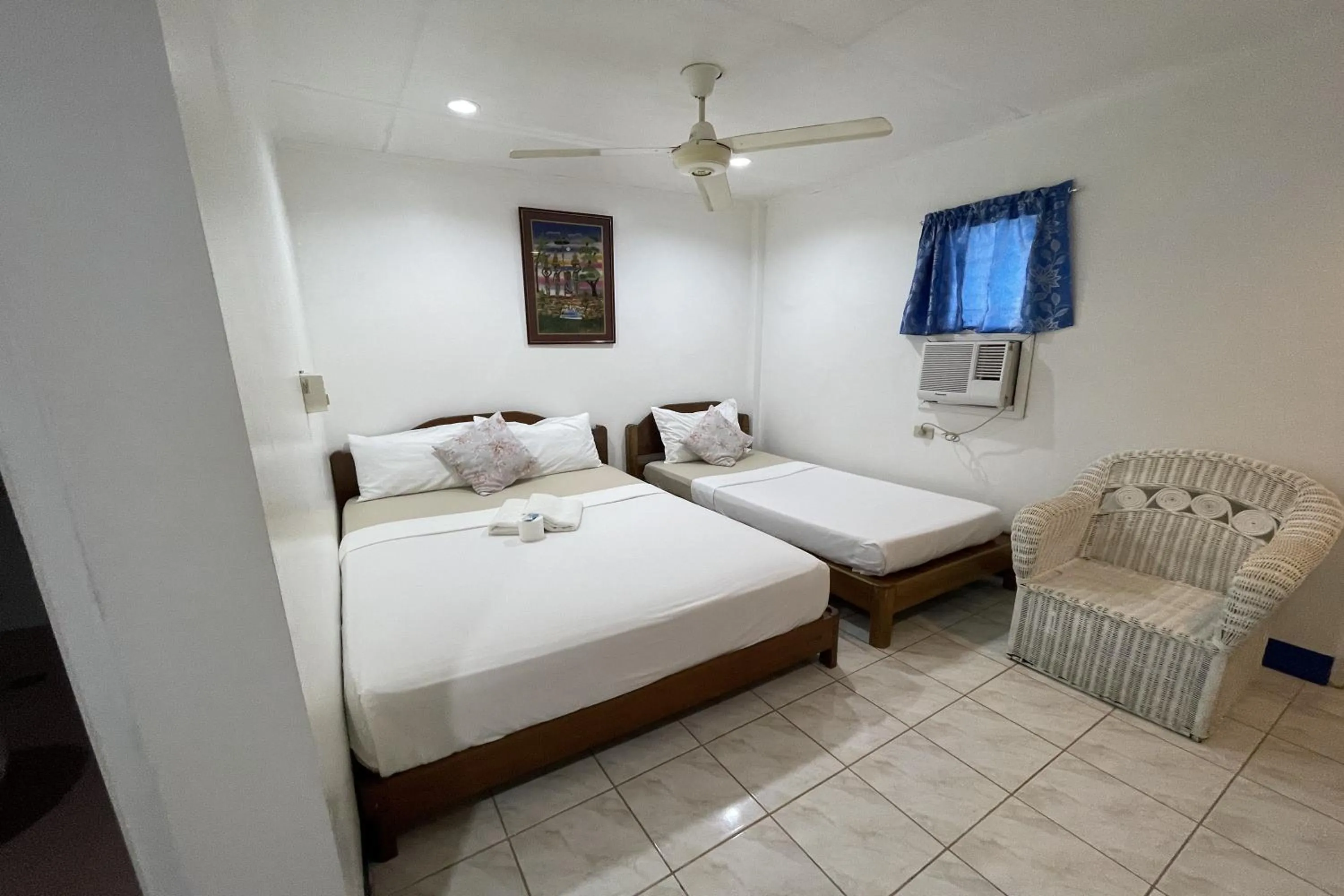 Photo of the whole room, Bed in Casa de Praxides Tourist Inn Palawan