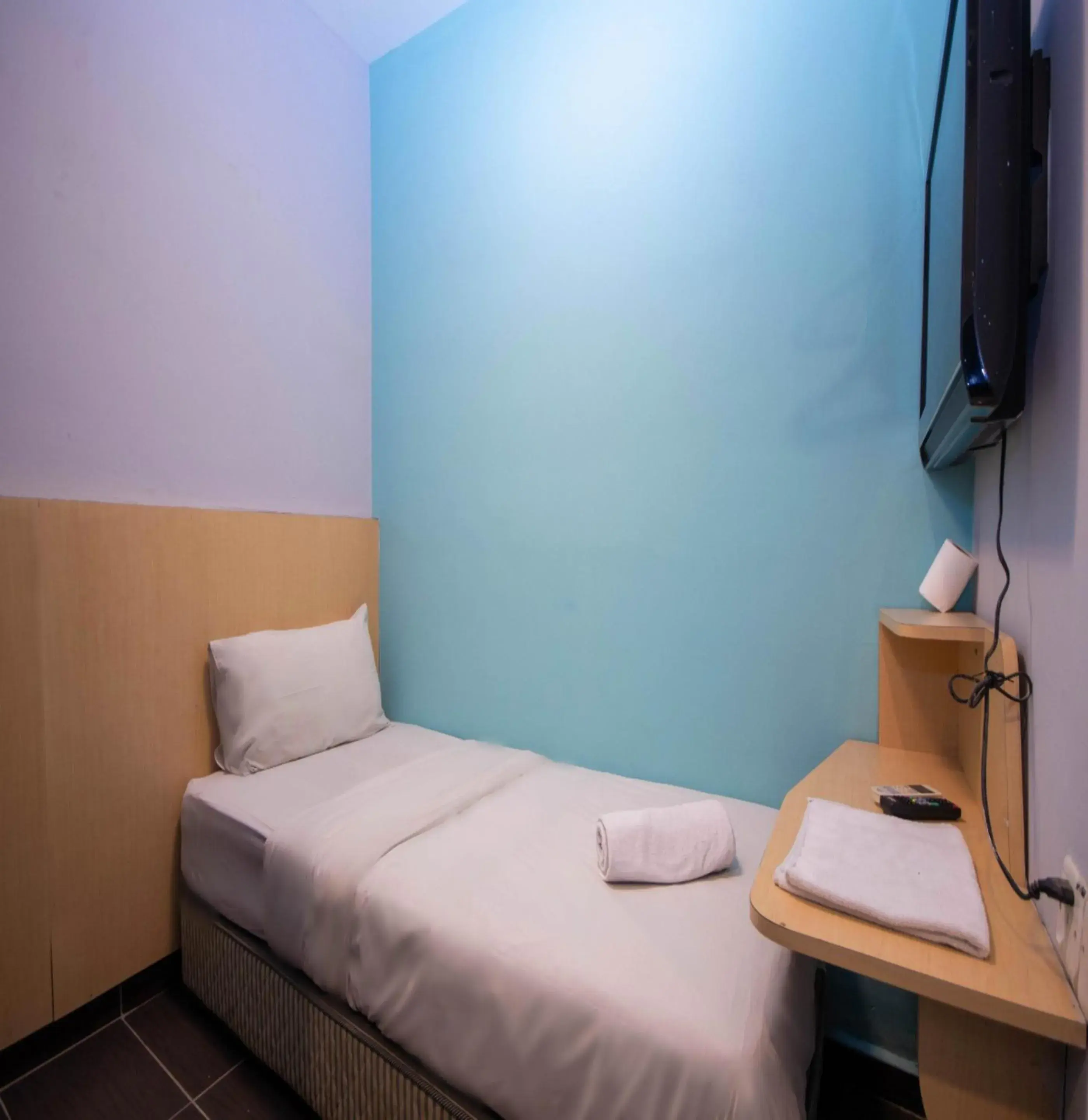 Bed in JQ Station Eight Inn Bed in JQ Station Eight Inn