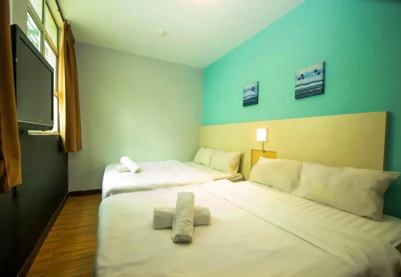 Bed in JQ Station Eight Inn Bed in JQ Station Eight Inn