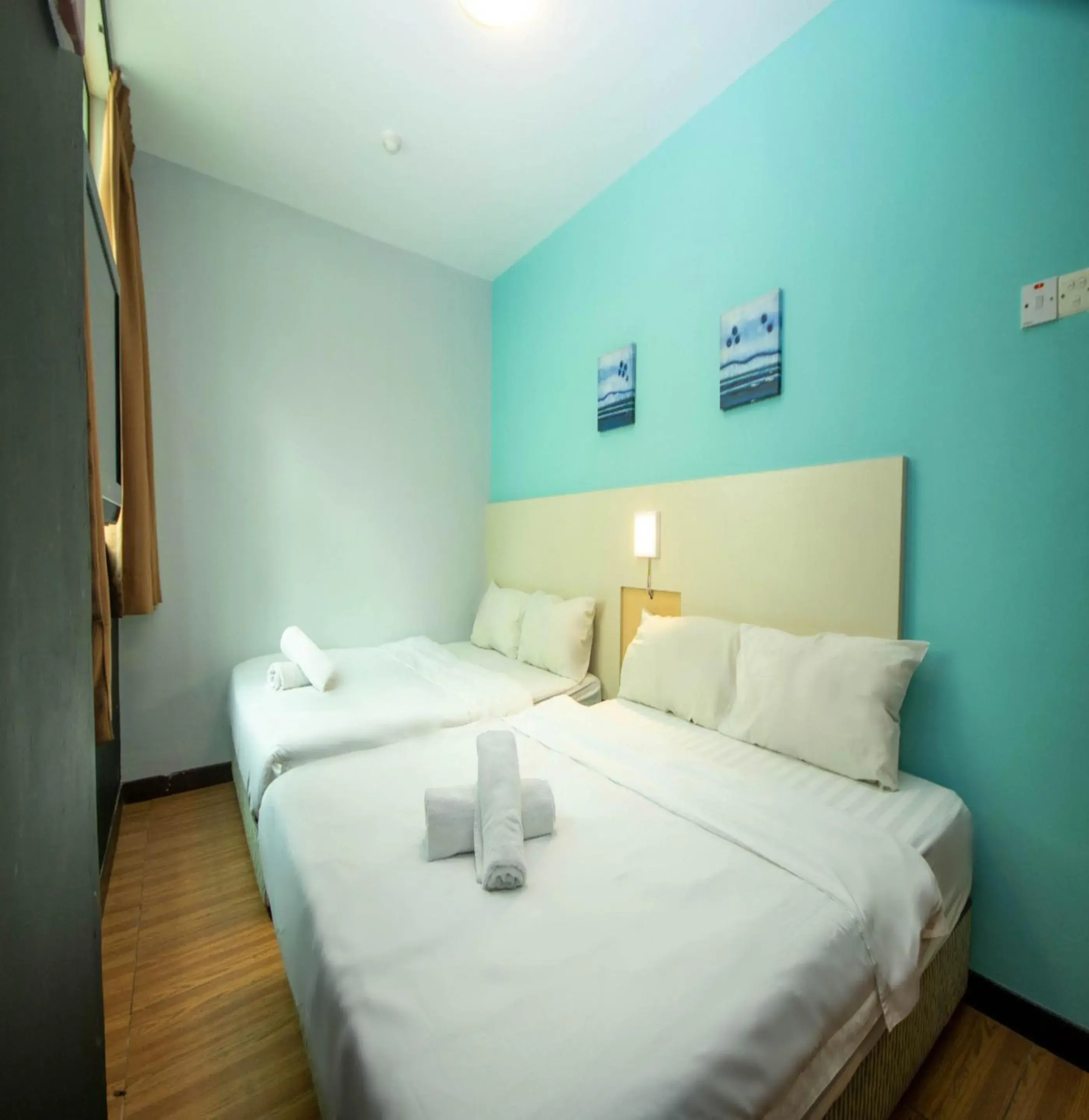 Bed in JQ Station Eight Inn Bed in JQ Station Eight Inn