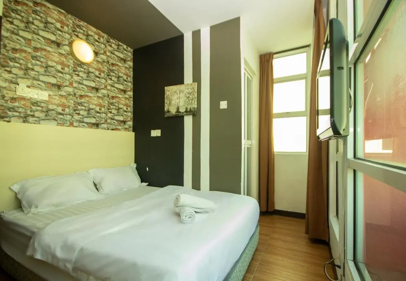 Bed in JQ Station Eight Inn Bed in JQ Station Eight Inn