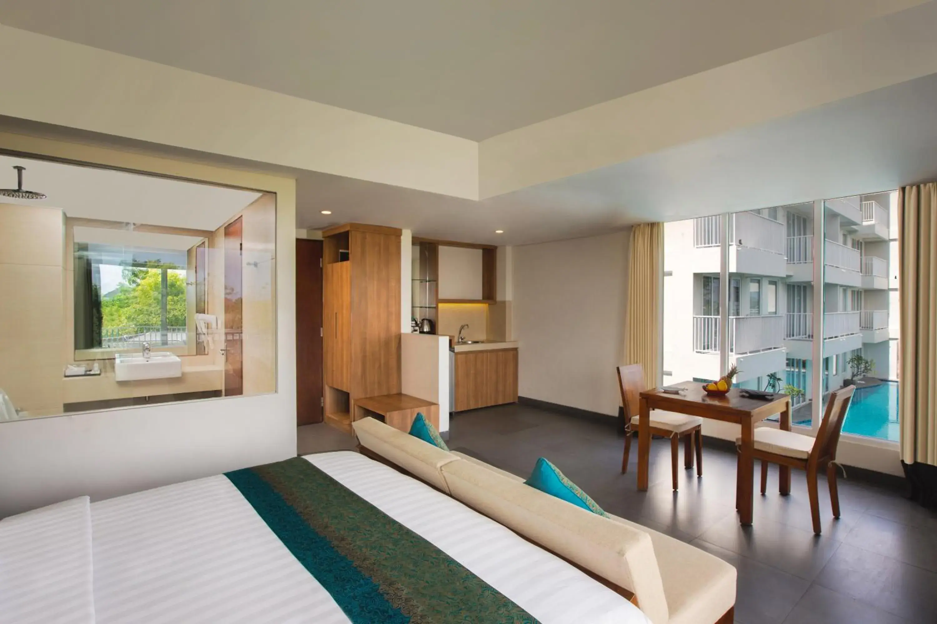 Seating area, Bed in Paragon Hotel Seminyak Seating area, Bed in Paragon Hotel Seminyak