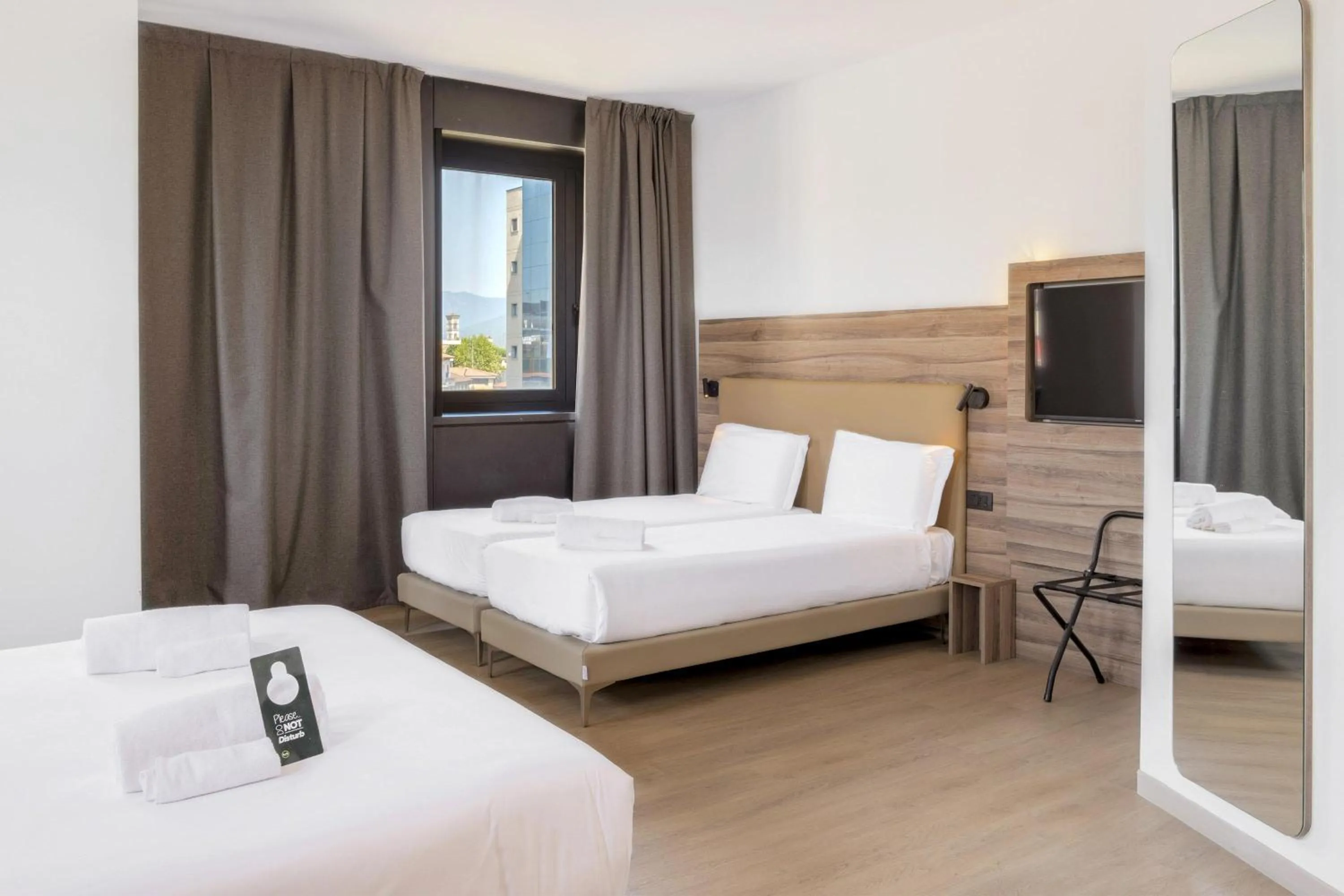 Photo of the whole room, Bed in B&B HOTEL Prato City Center