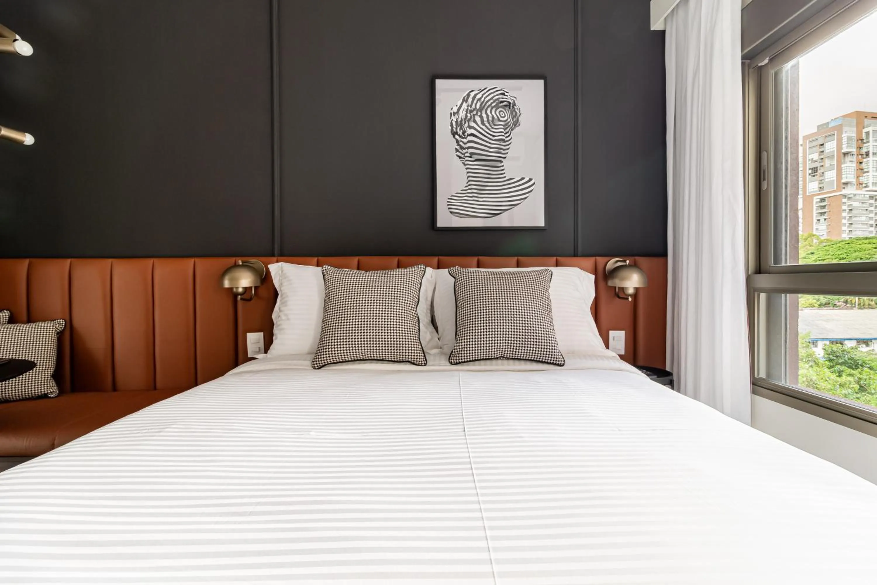 Bed in Iconyc Charlie Ibirapuera Hotel