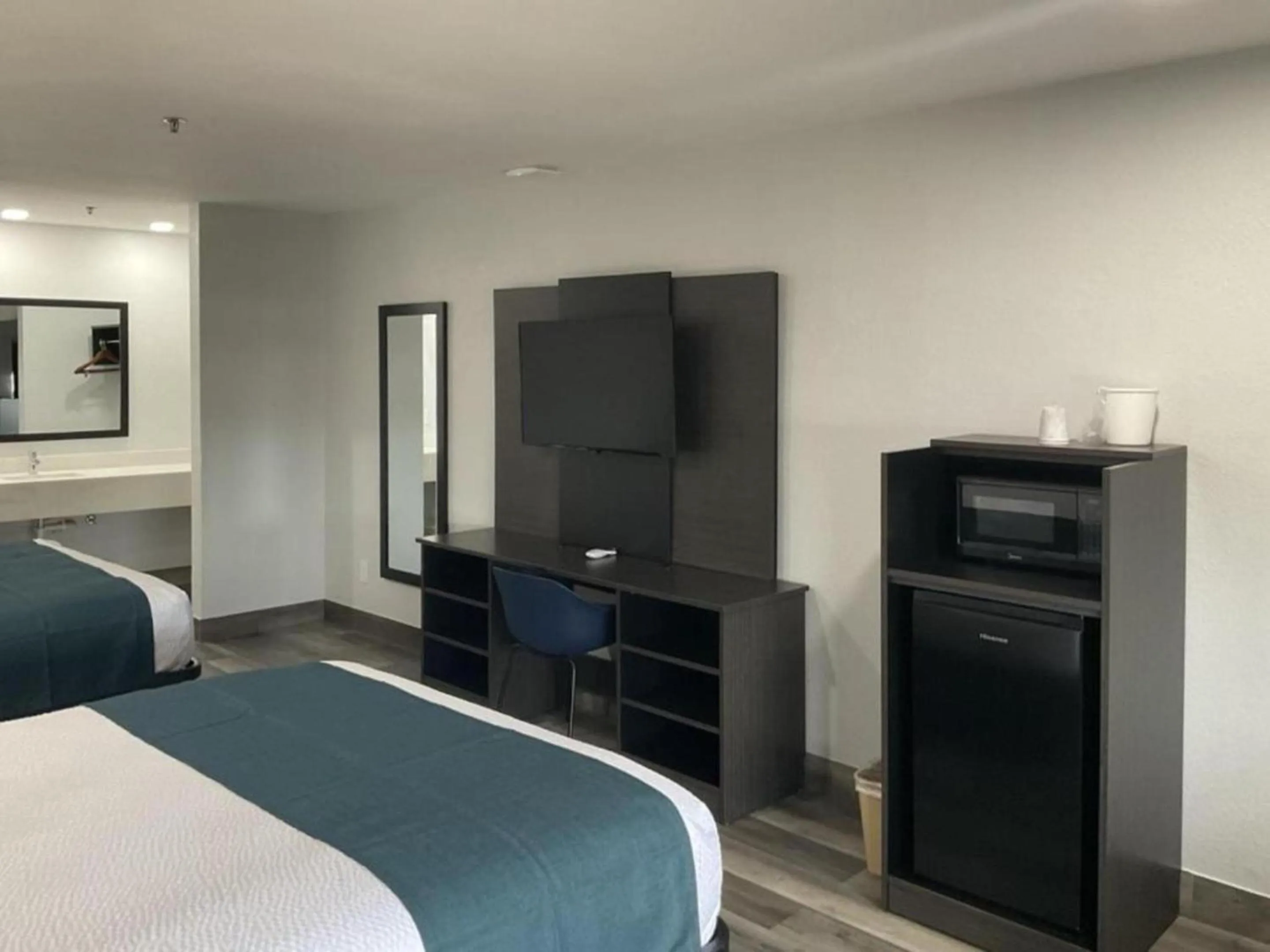 Bed in Studio 6 Suites Brenham, TX