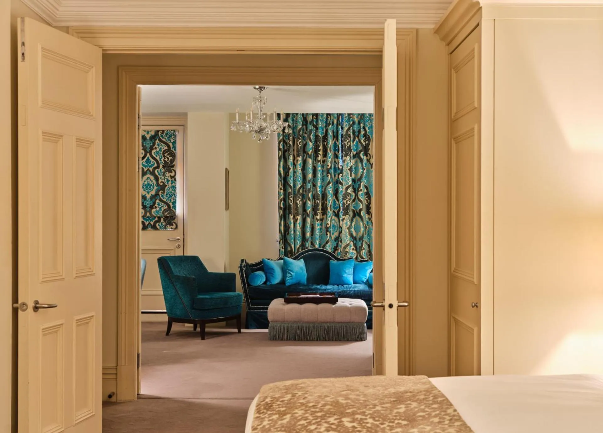 Living room, Bed in The Apartments by The Sloane Club