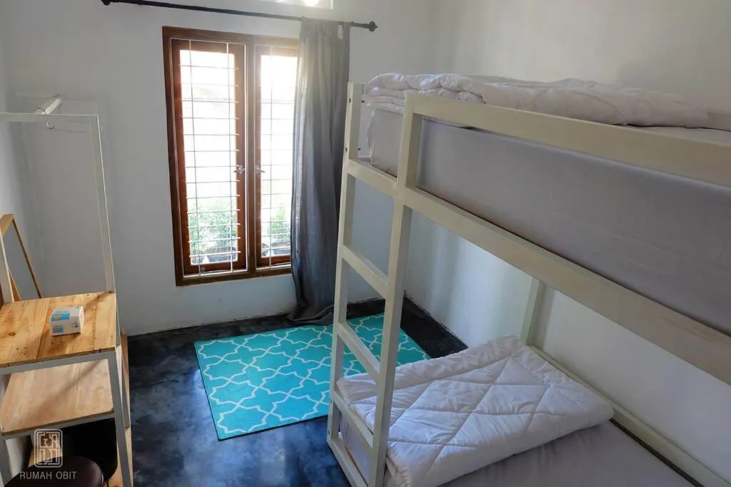 Bed in Homestay Jogja Rumah Obit By Simply Homy