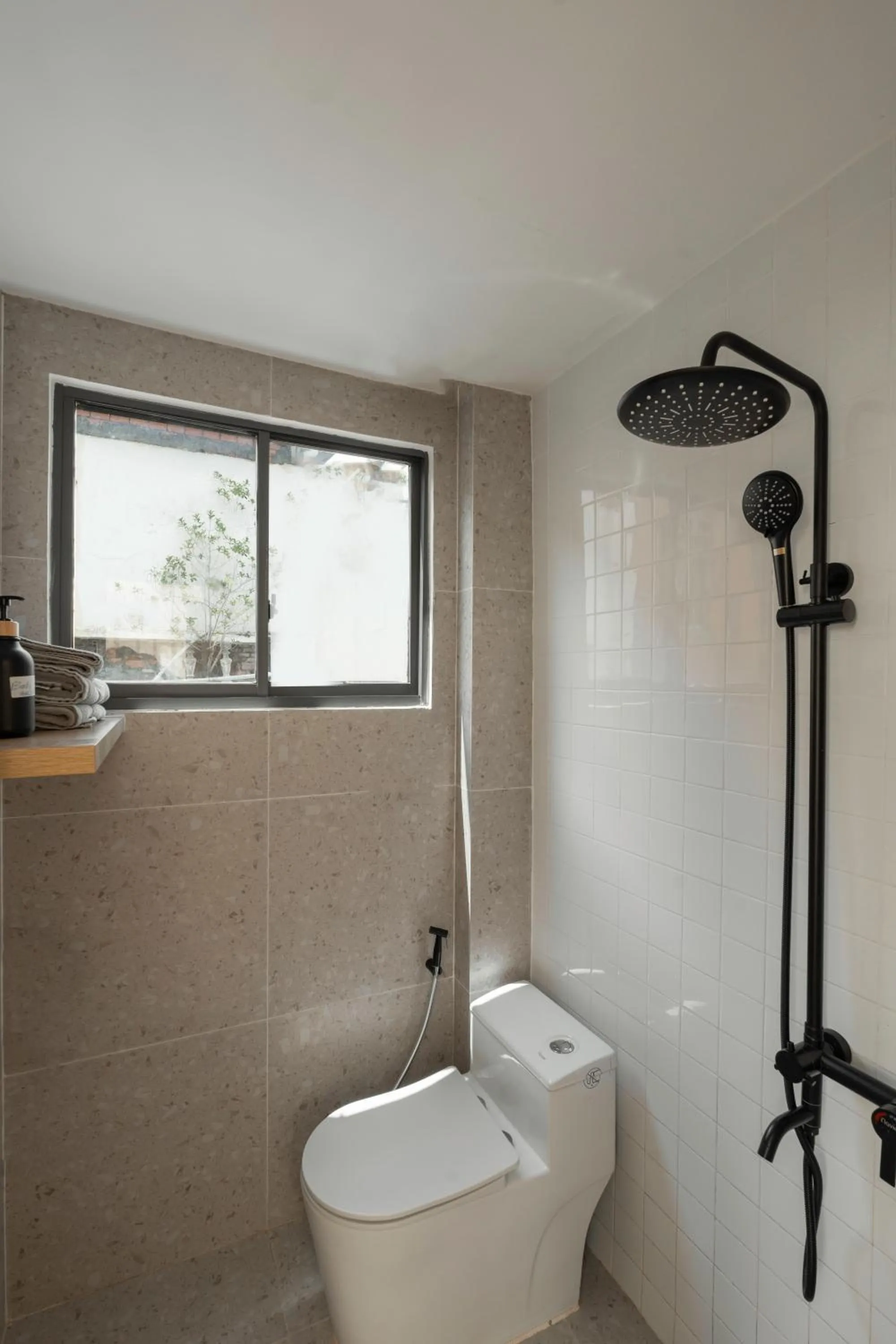 Toilet in Zeus Living - City Central