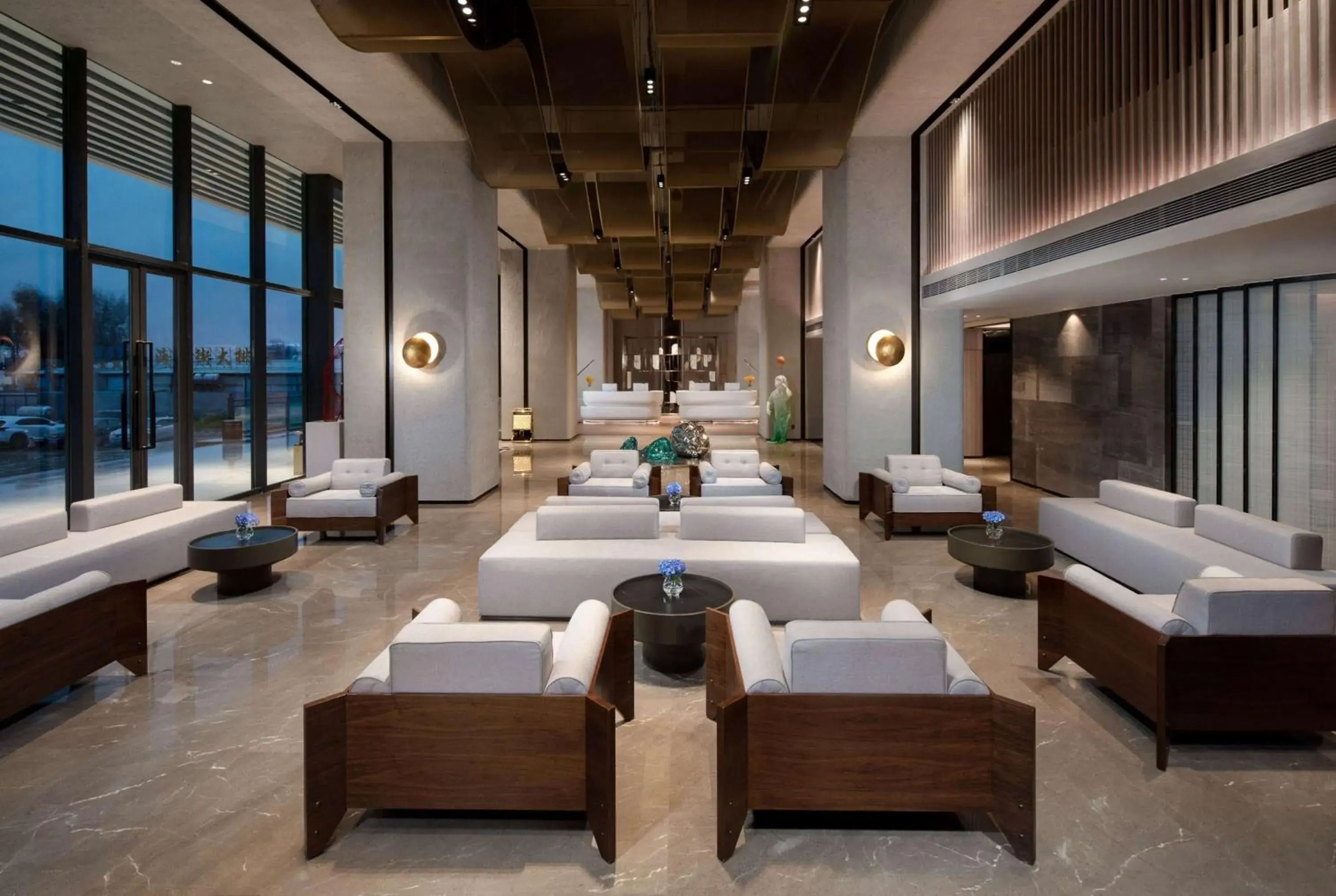 Lobby or reception in Ramada by Wyndham Huizhou Double Moon Bay Lobby or reception in Ramada by Wyndham Huizhou Double Moon Bay