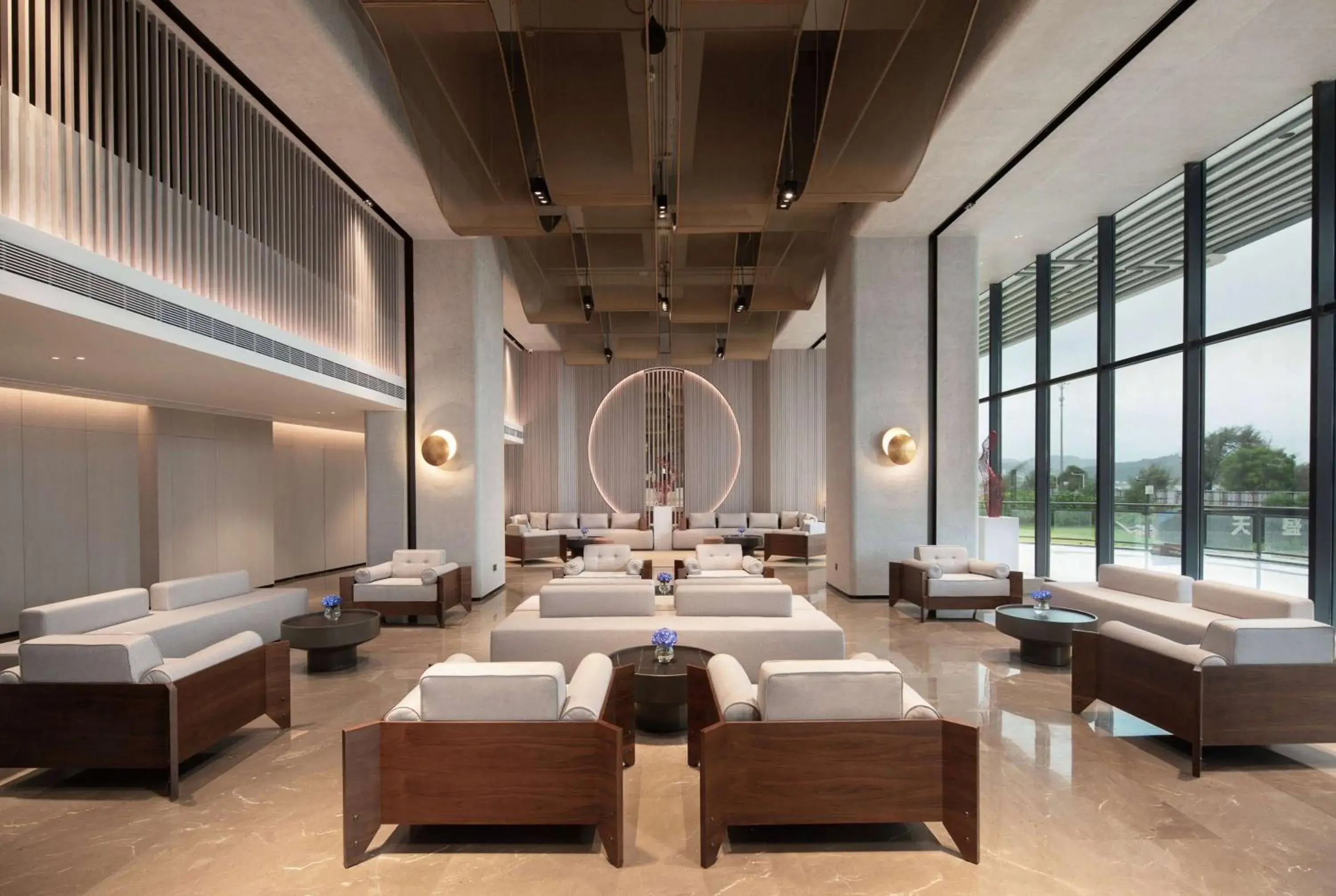 Lobby or reception in Ramada by Wyndham Huizhou Double Moon Bay Lobby or reception in Ramada by Wyndham Huizhou Double Moon Bay